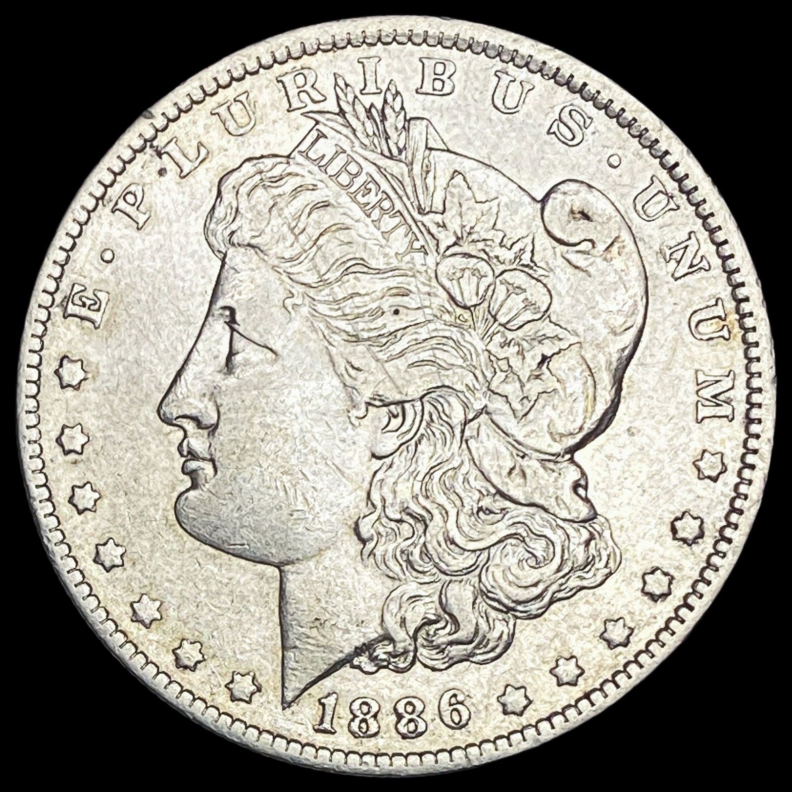 1886-O Silver Morgan Dollar NEARLY UNCIRCULATED (1 of 2)