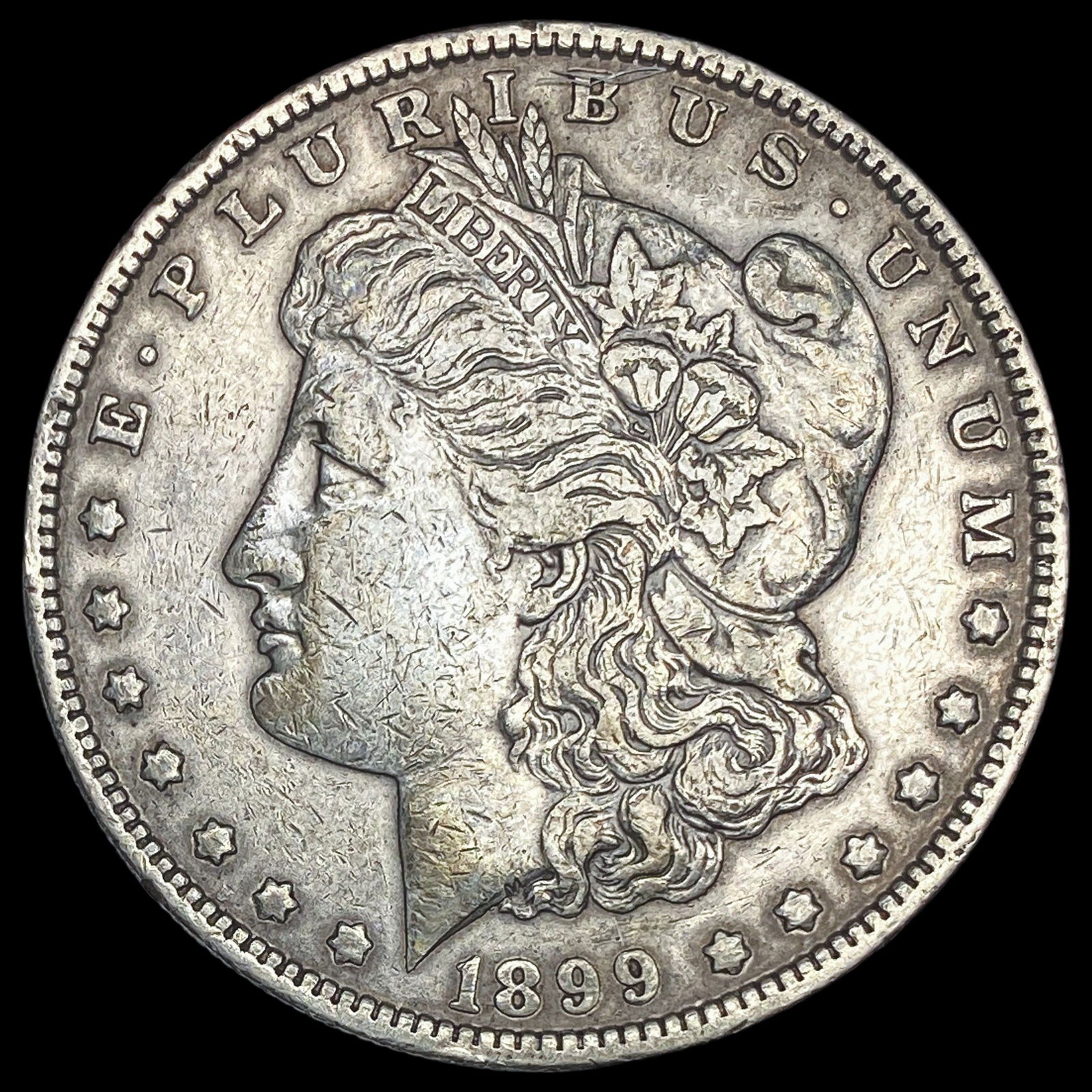 1899 Silver Morgan Dollar NEARLY UNCIRCULATED (1 of 2)
