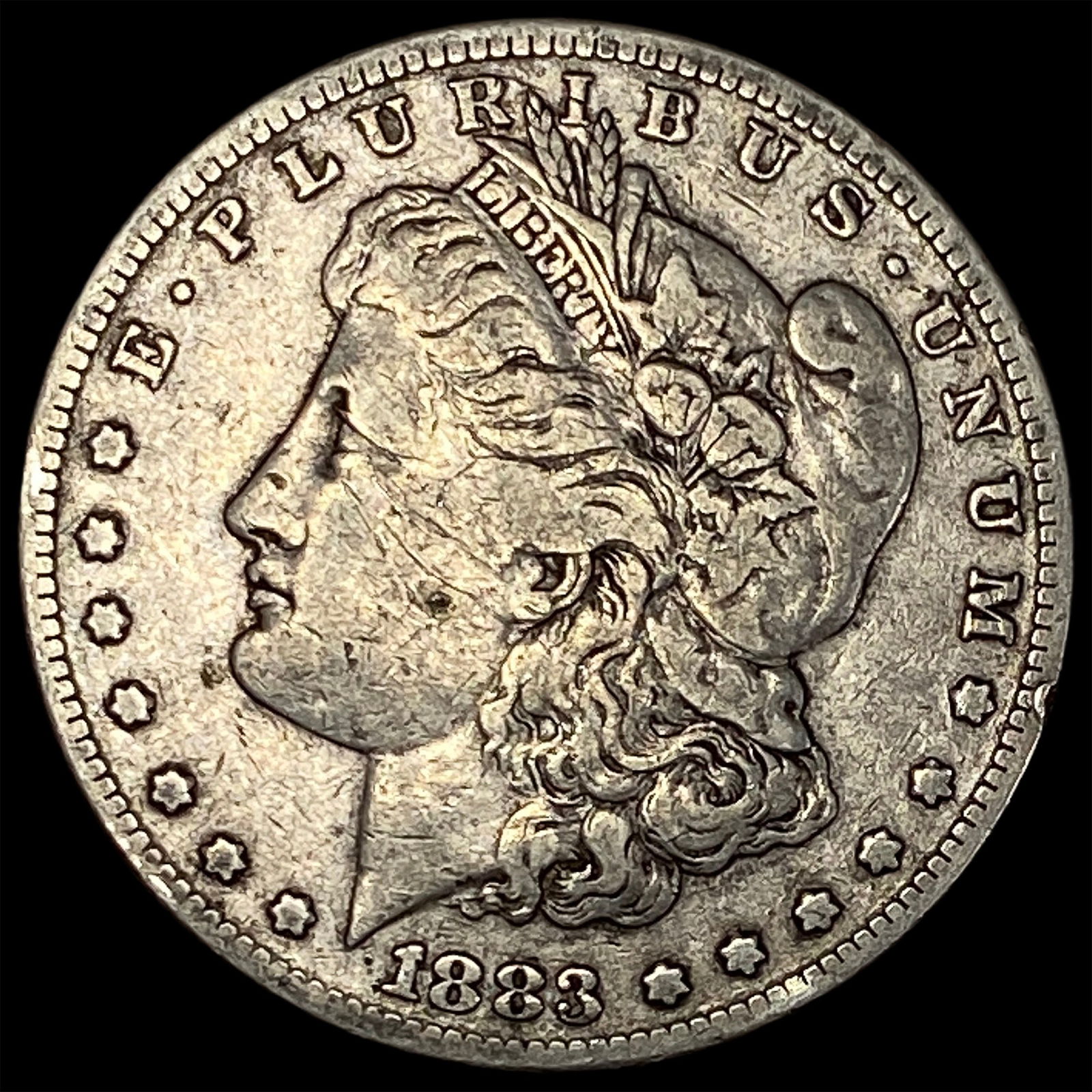 1883-O Silver Morgan Dollar ABOUT UNCIRCULATED: 1883-O Silver Morgan Dollar ABOUT UNCIRCULATED