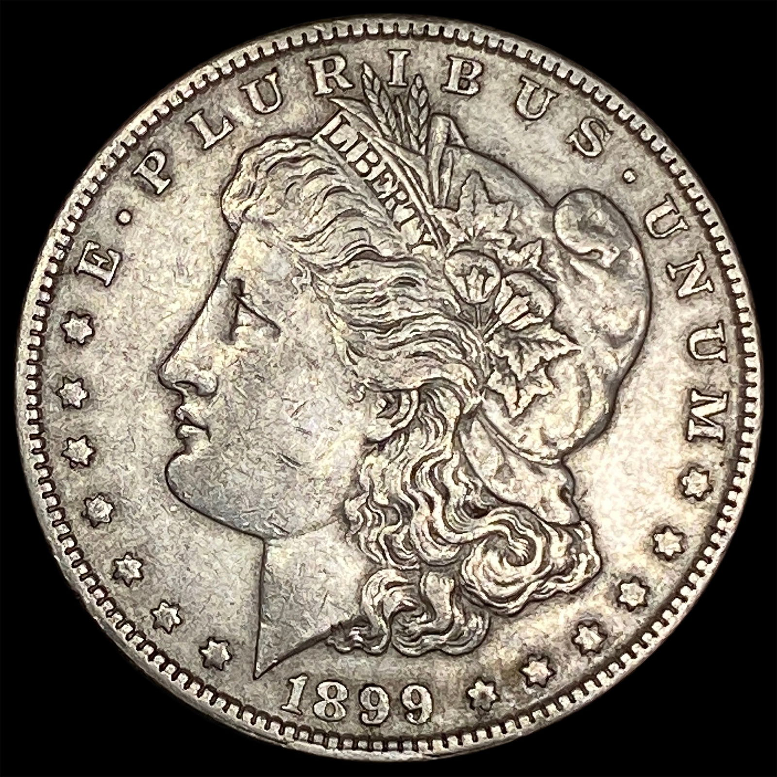 1899 Silver Morgan Dollar NEARLY UNCIRCULATED (1 of 2)
