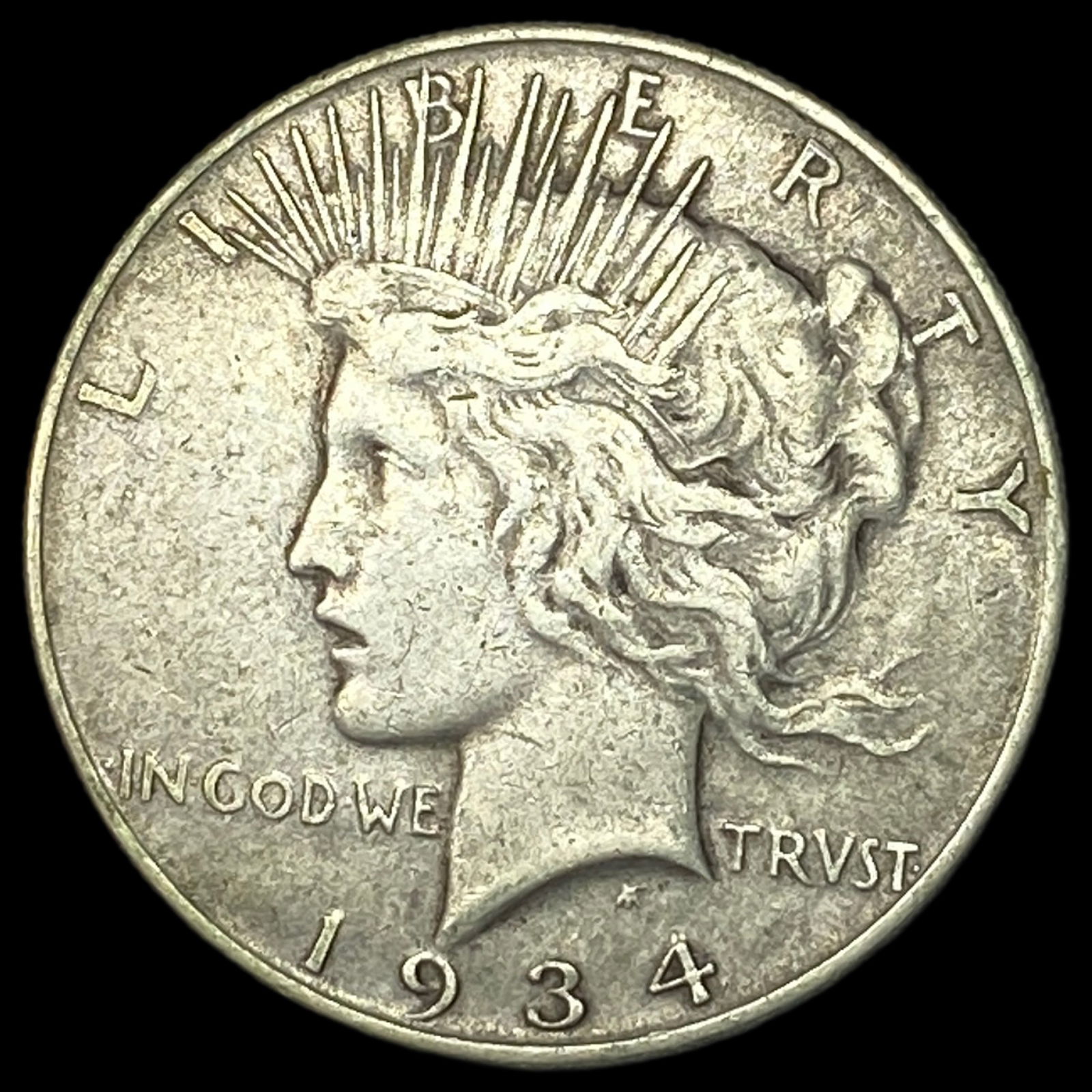 1934 Silver Peace Dollar ABOUT UNCIRCULATED (1 of 2)