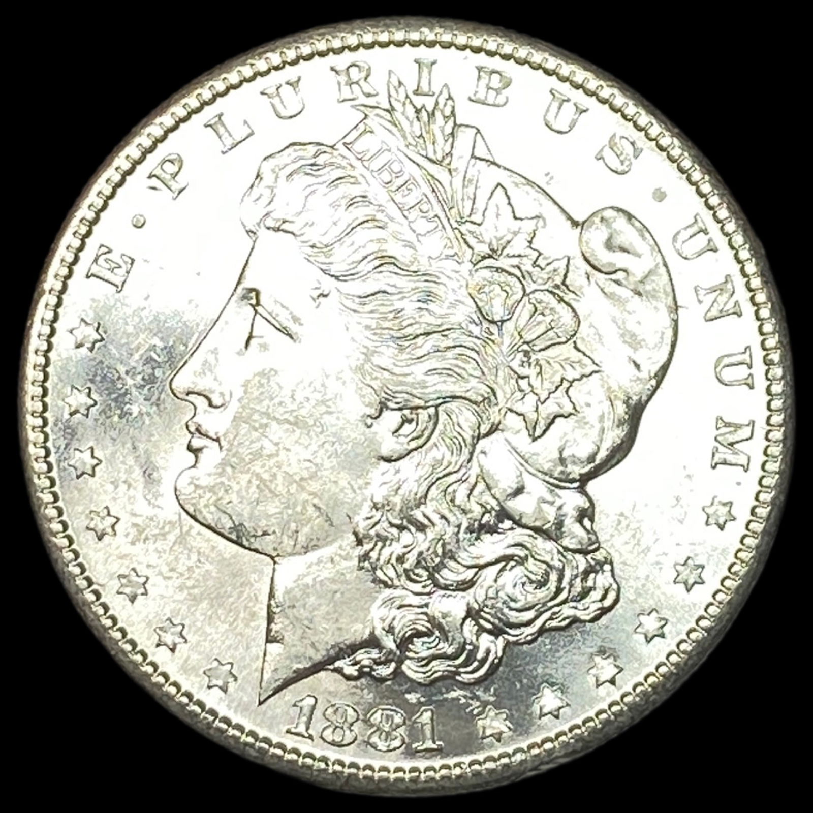 This is a 1881 Morgan Silver Dollar. UNCIRCULATED (1 of 2)