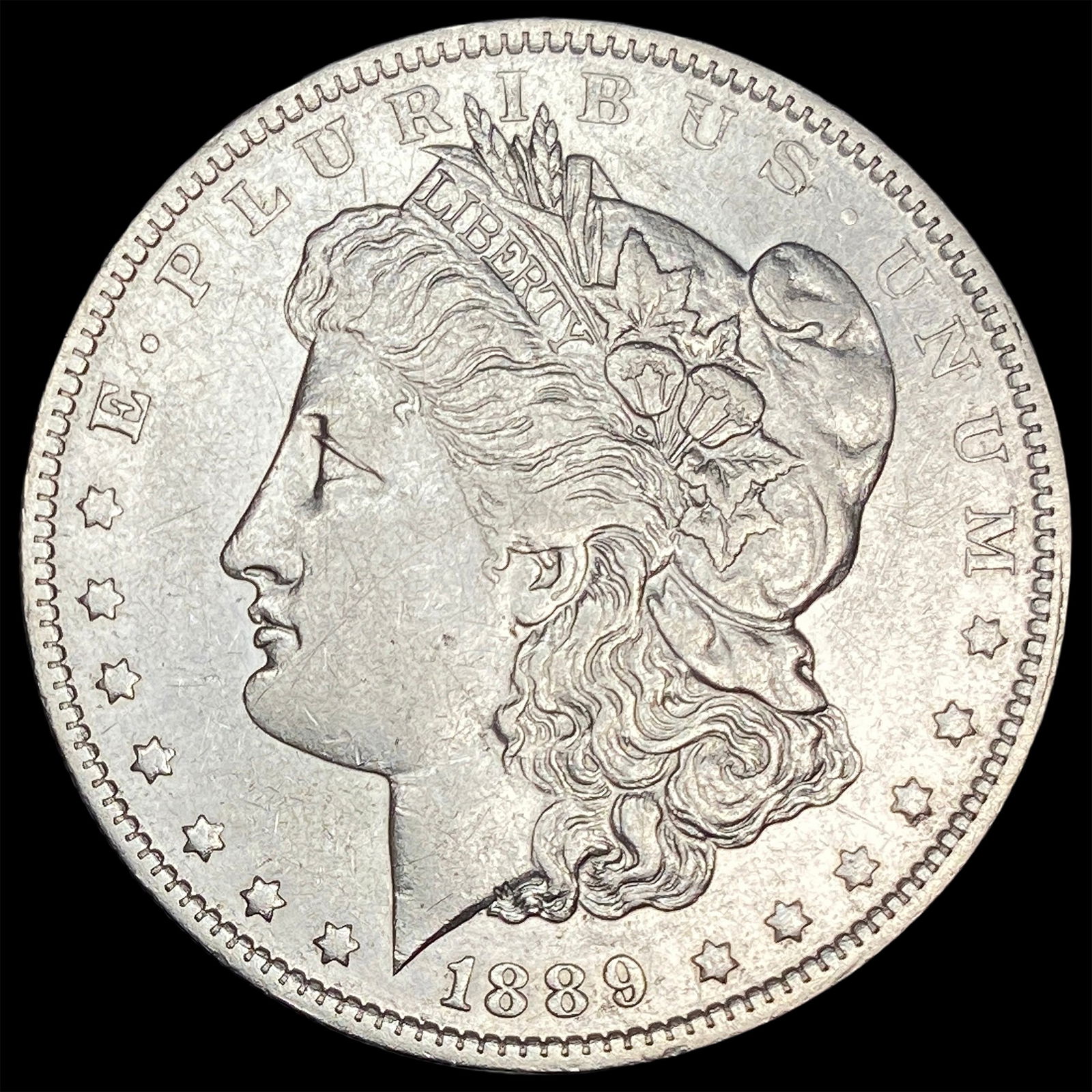1889-O Silver Morgan Dollar CLOSELY UNCIRCULATED (1 of 2)