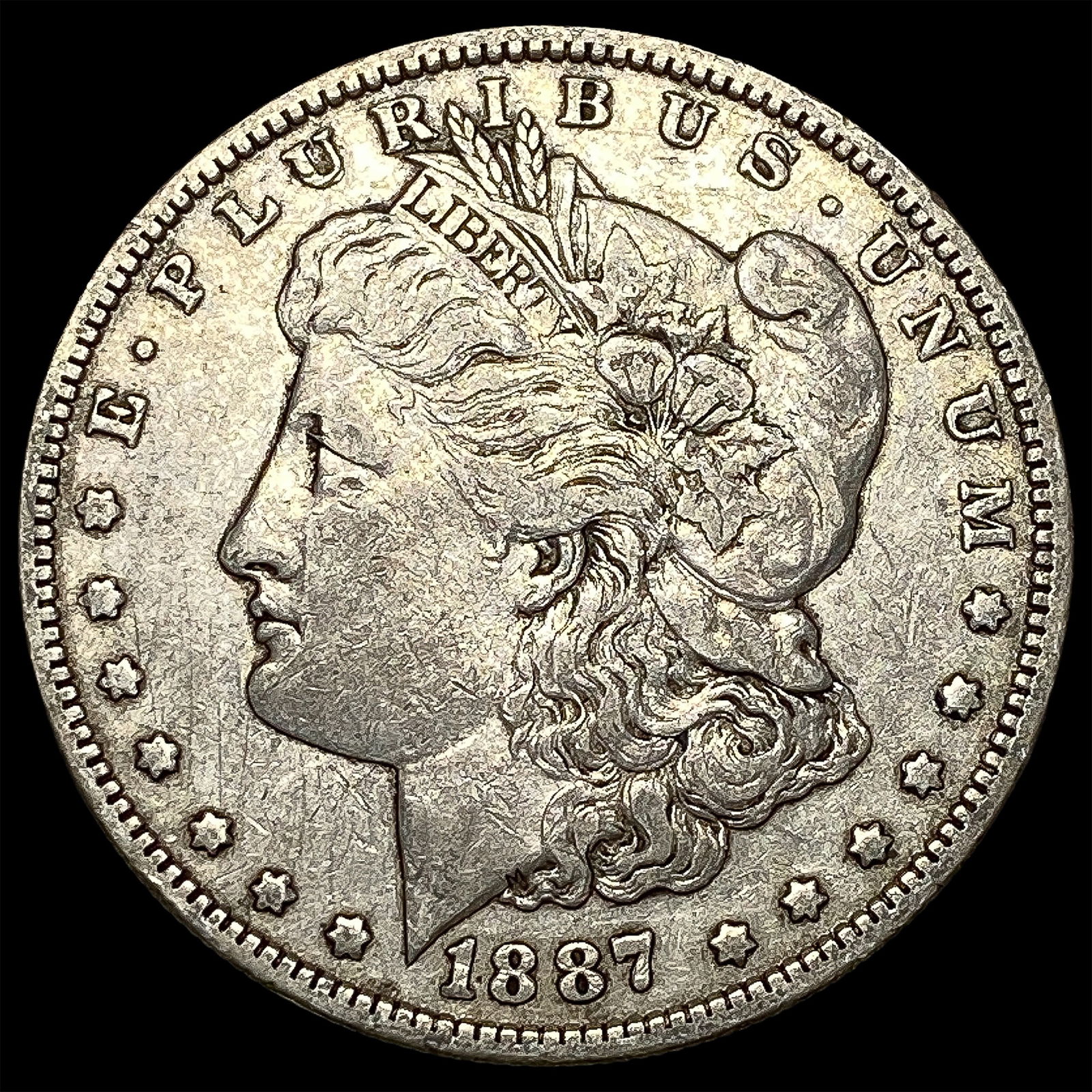 1887-O Silver Morgan Dollar NEARLY UNCIRCULATED (1 of 2)