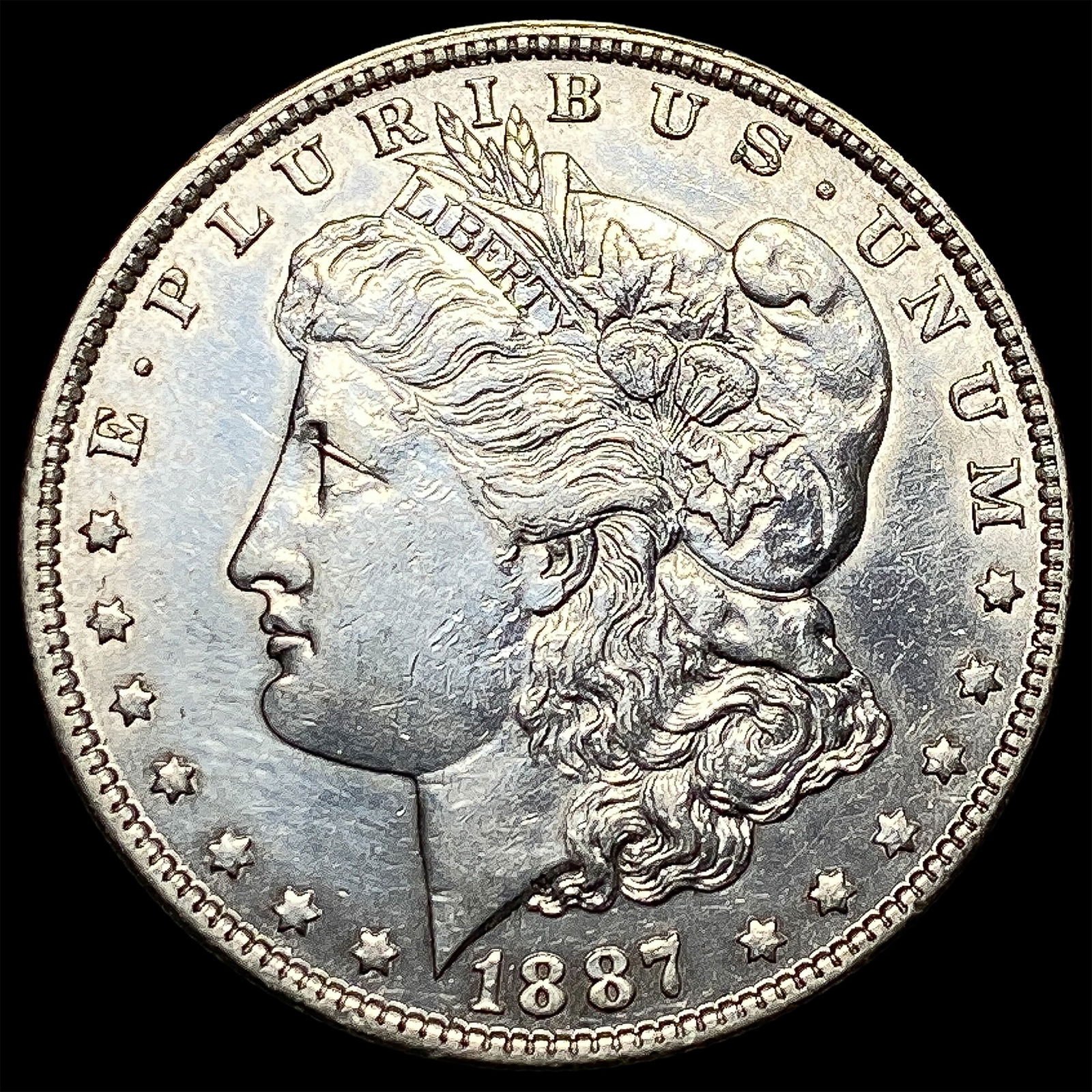 1887-O Silver Morgan Dollar CLOSELY UNCIRCULATED (1 of 2)