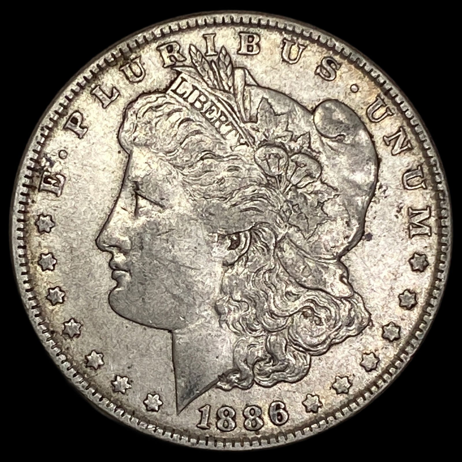 1886 Morgan Silver Dollar NEARLY UNCIRCULATED: 1886 Morgan Silver Dollar NEARLY UNCIRCULATED