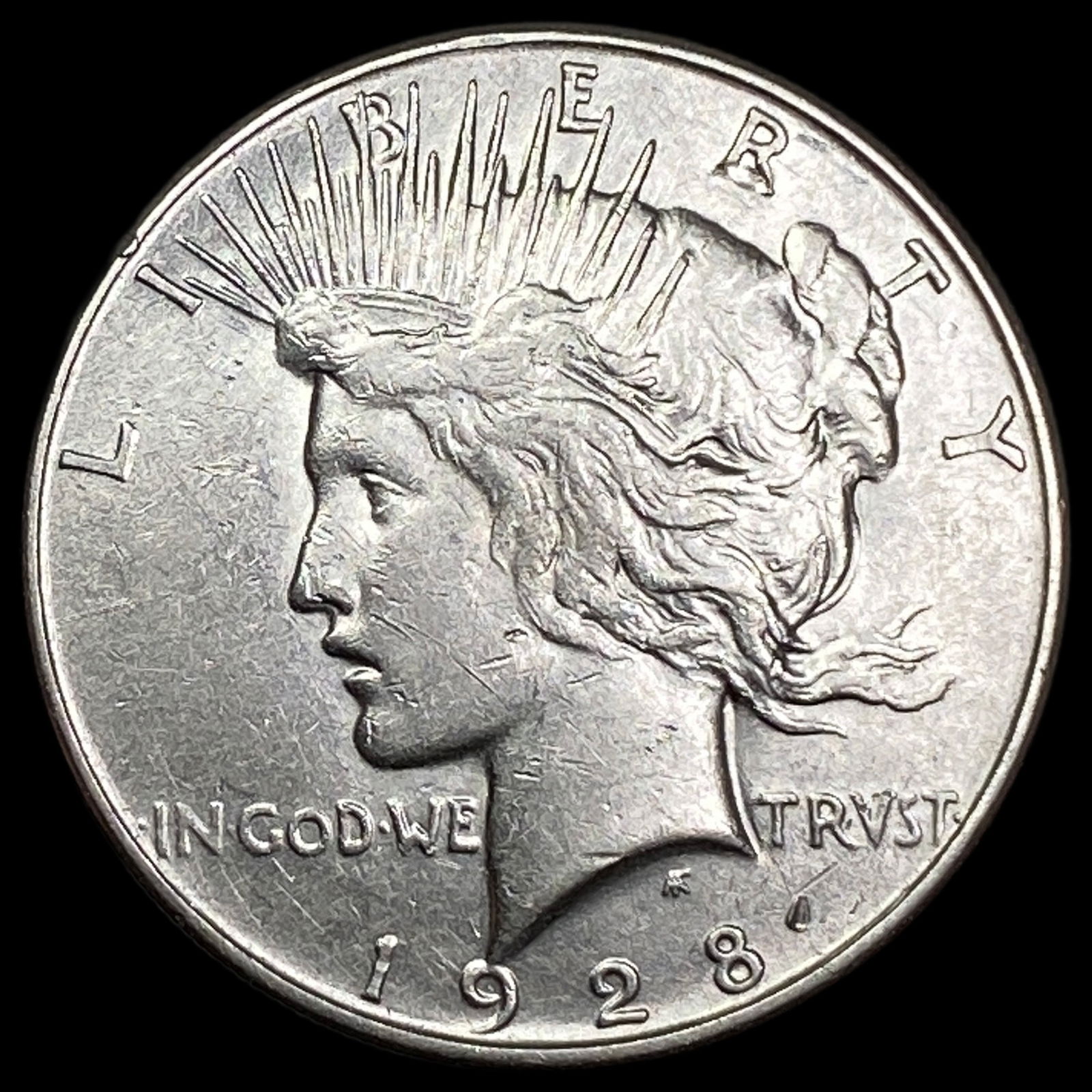 1928 Silver Peace Dollar NEARLY UNCIRCULATED (1 of 2)