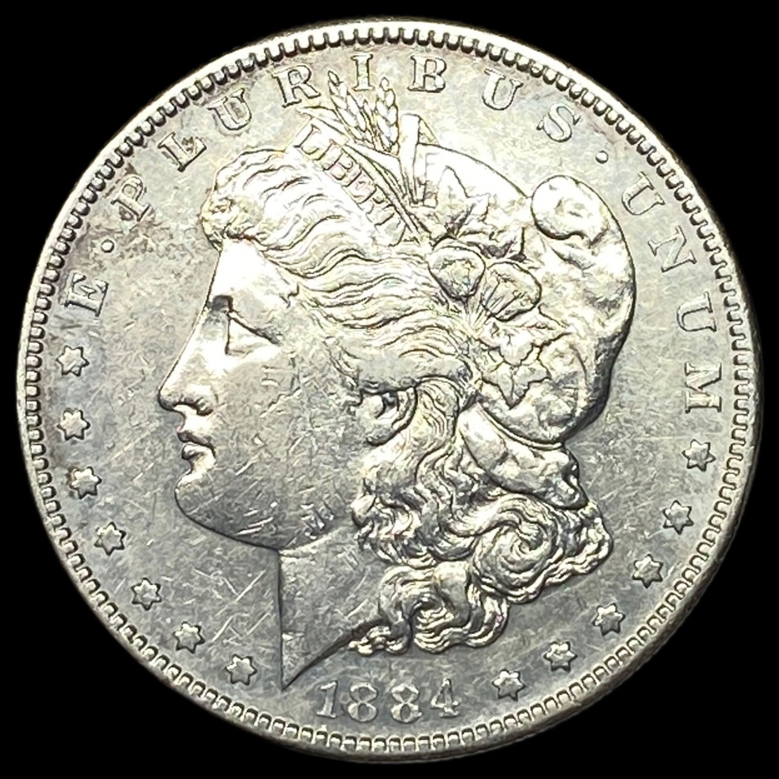 1884 Morgan Silver Dollar CLOSELY UNCIRCULATED (1 of 2)