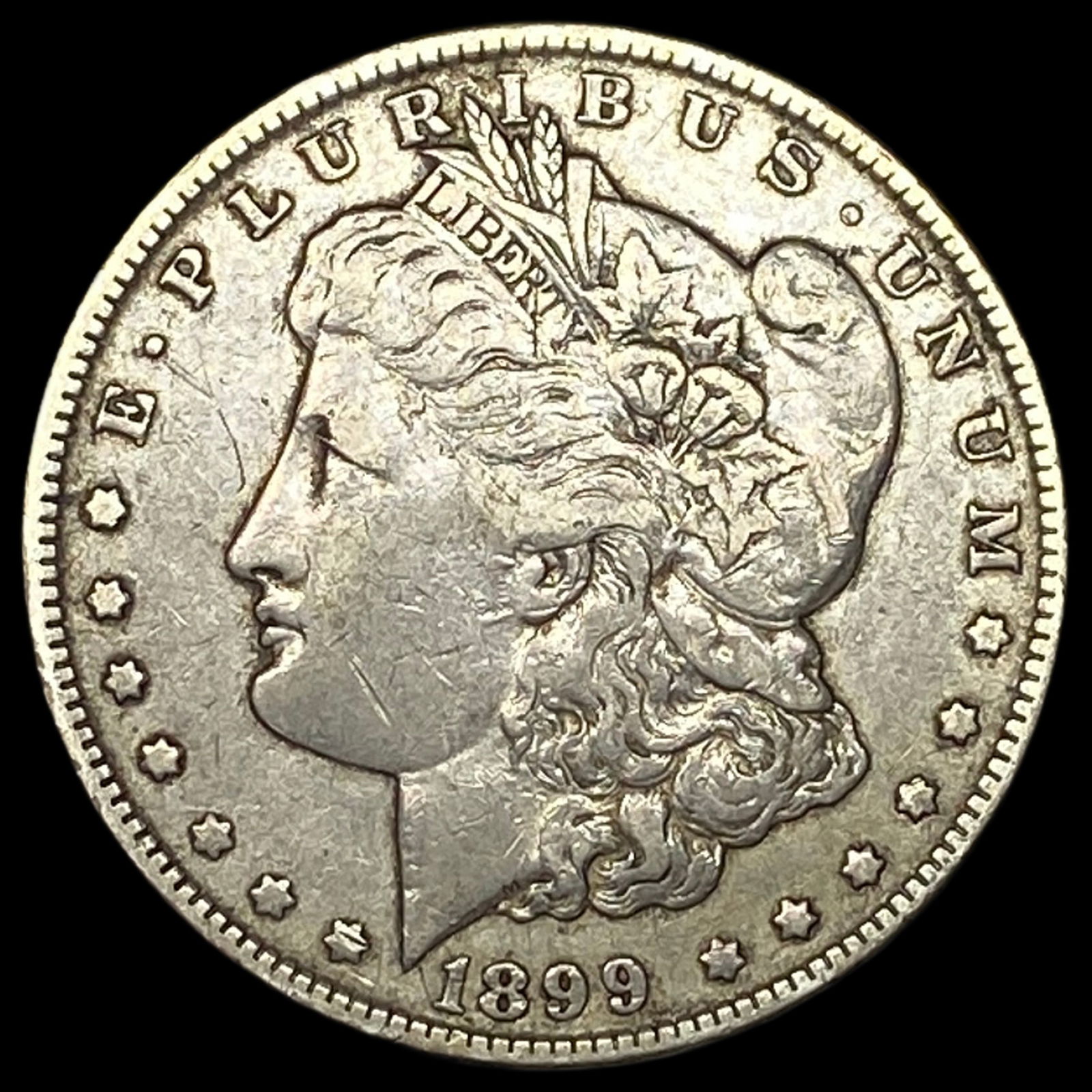 1899 Morgan Silver Dollar NEARLY UNCIRCULATED (1 of 2)
