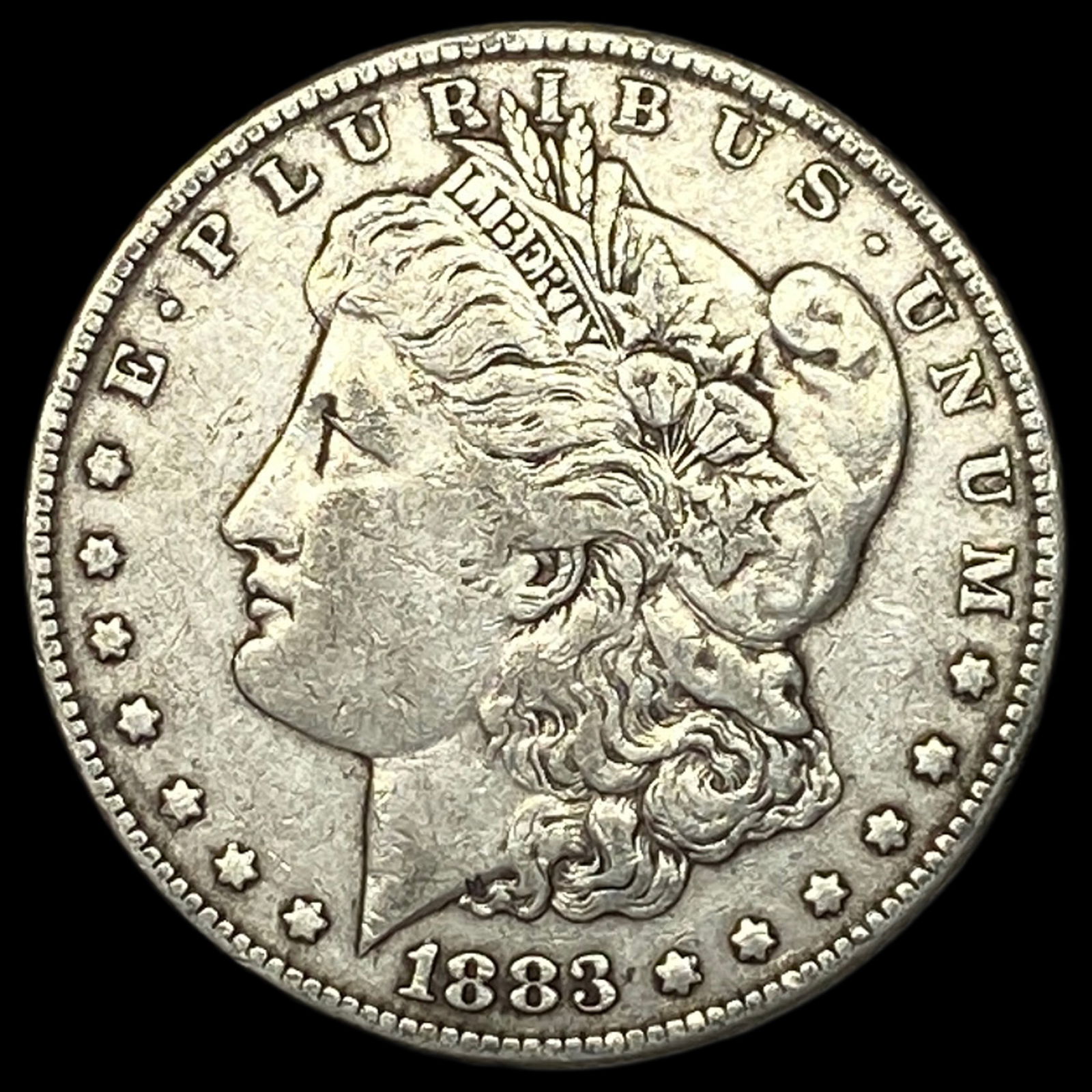 1883 Silver Morgan Dollar NEARLY UNCIRCULATED (1 of 2)
