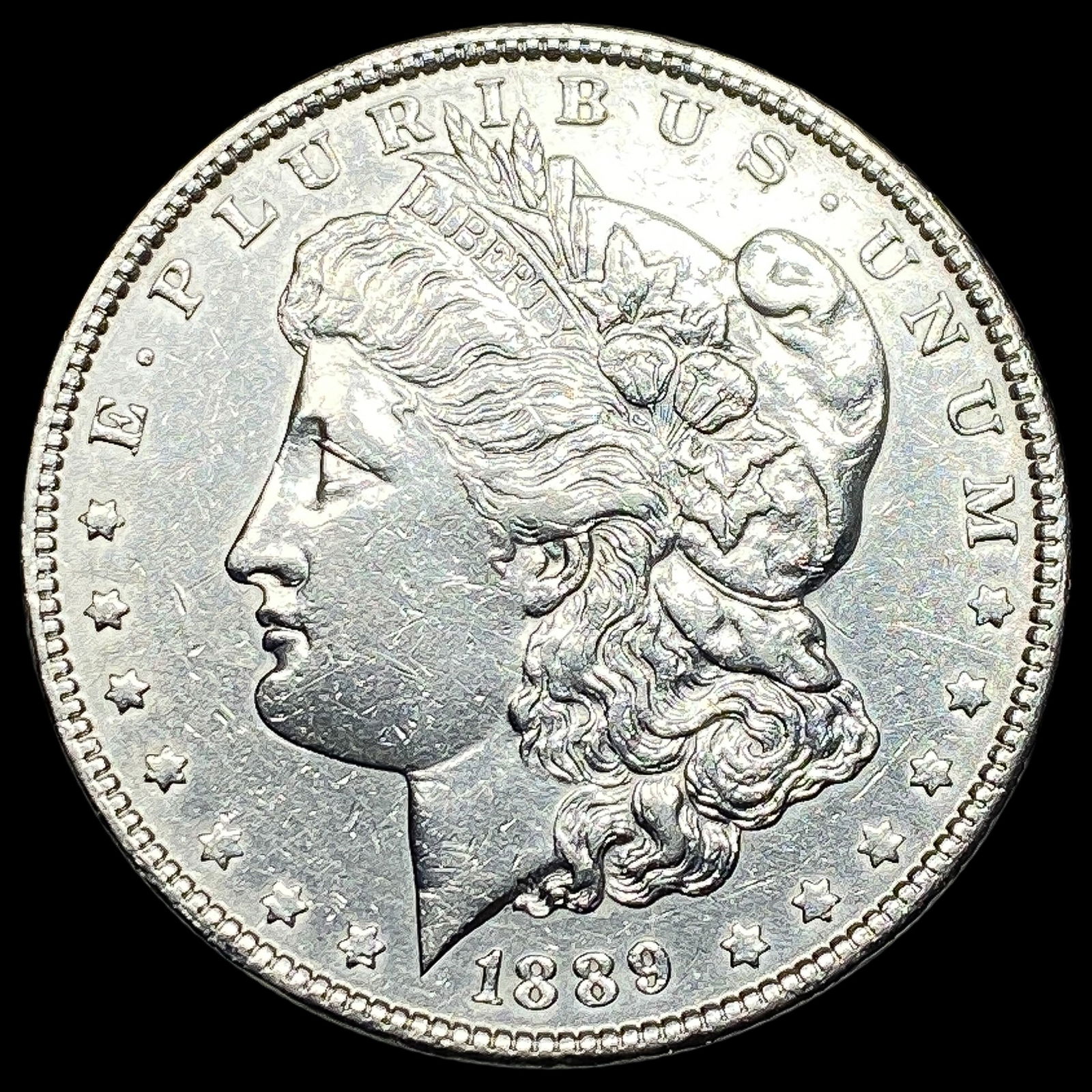 1889 Morgan Silver Dollar CLOSELY UNCIRCULATED (1 of 2)