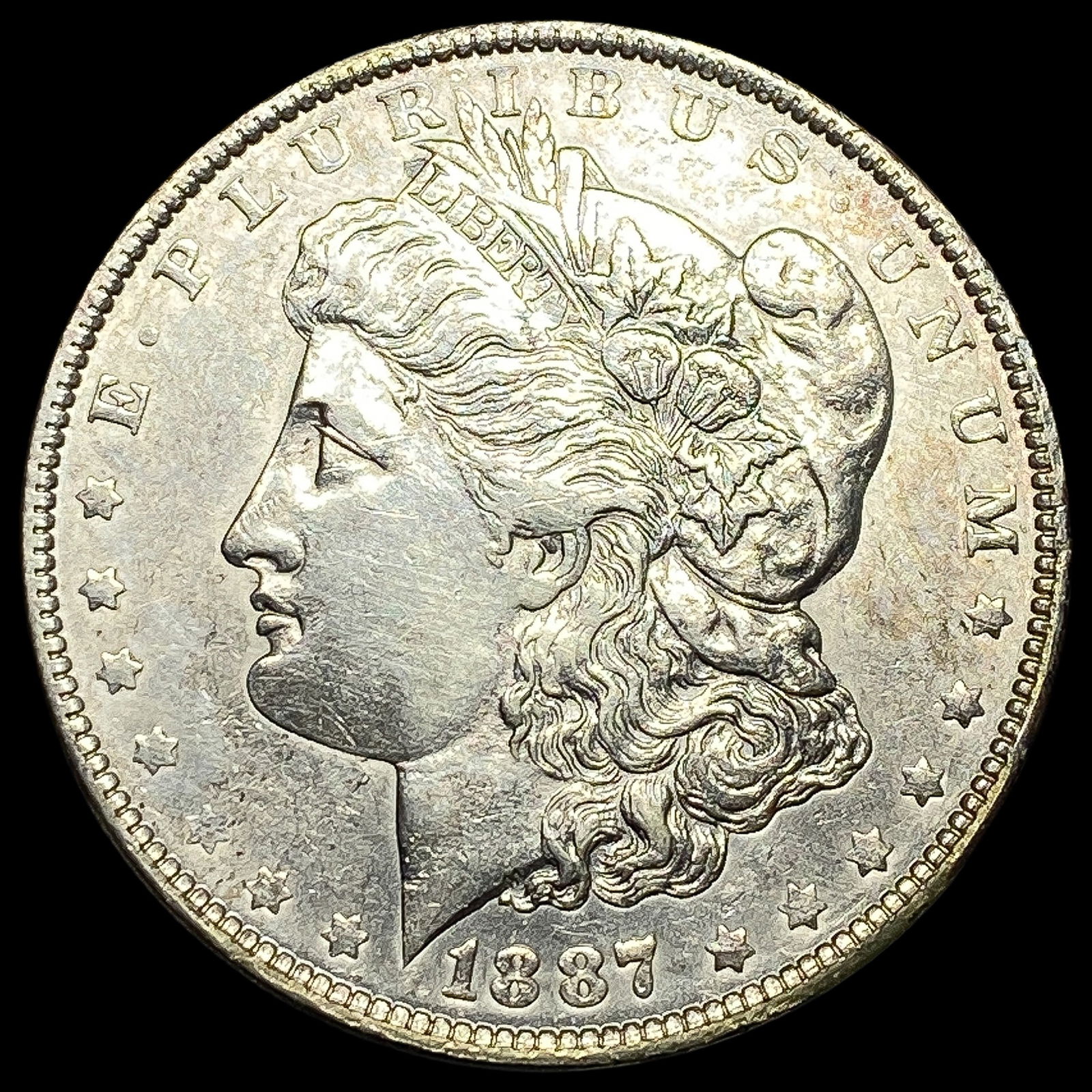 1887-O Silver Morgan Dollar CLOSELY UNCIRCULATED (1 of 2)