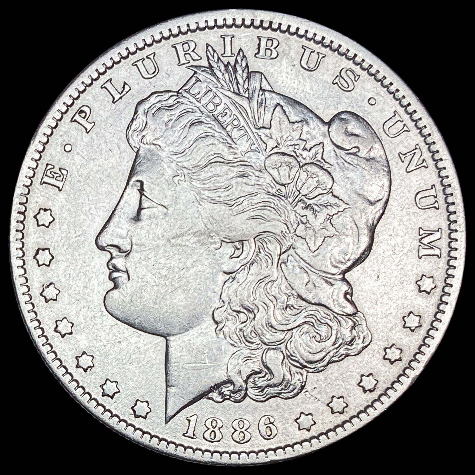 1886 Silver Morgan Dollar CLOSELY UNCIRCULATED (1 of 2)