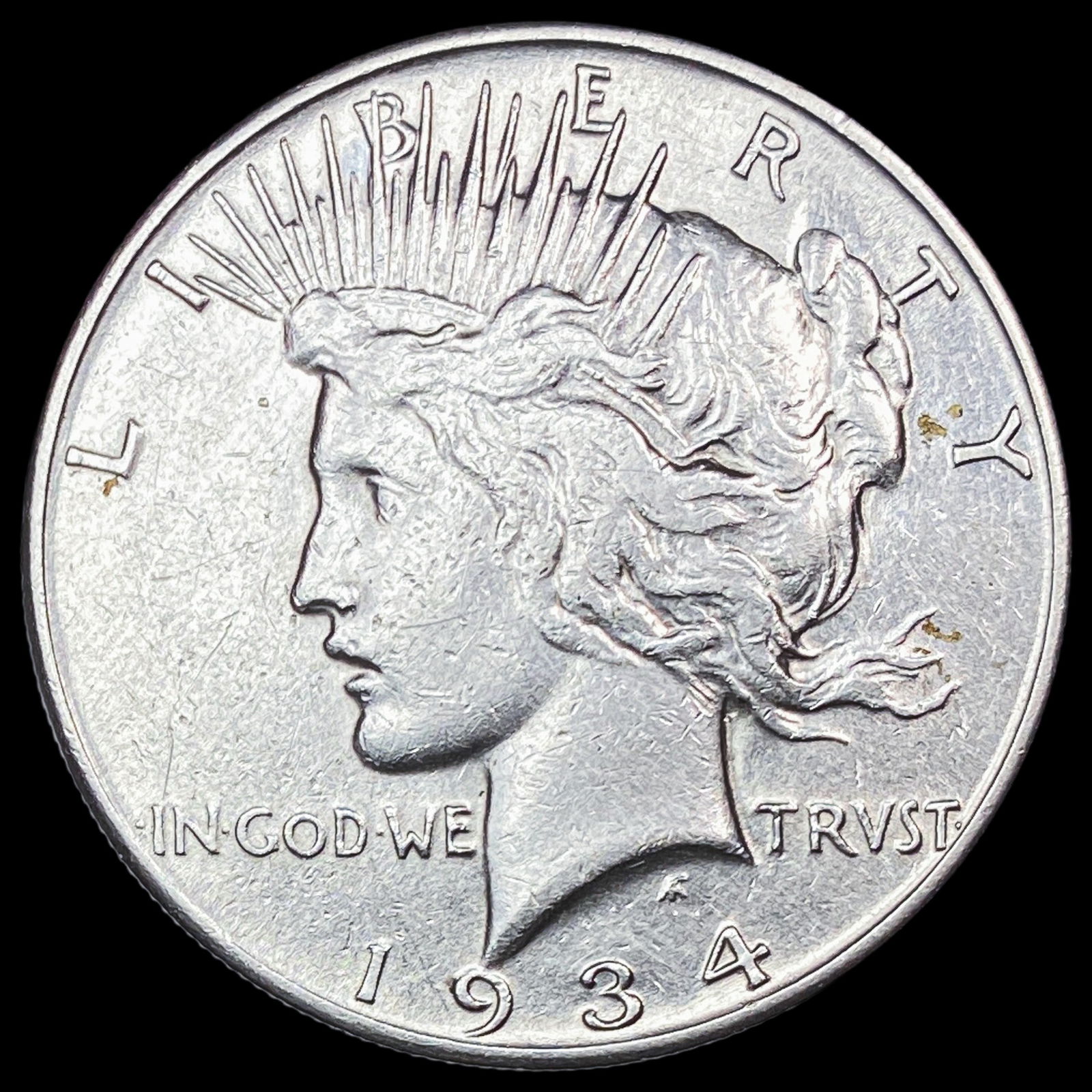 1934 Peace Silver Dollar NEARLY UNCIRCULATED (1 of 2)