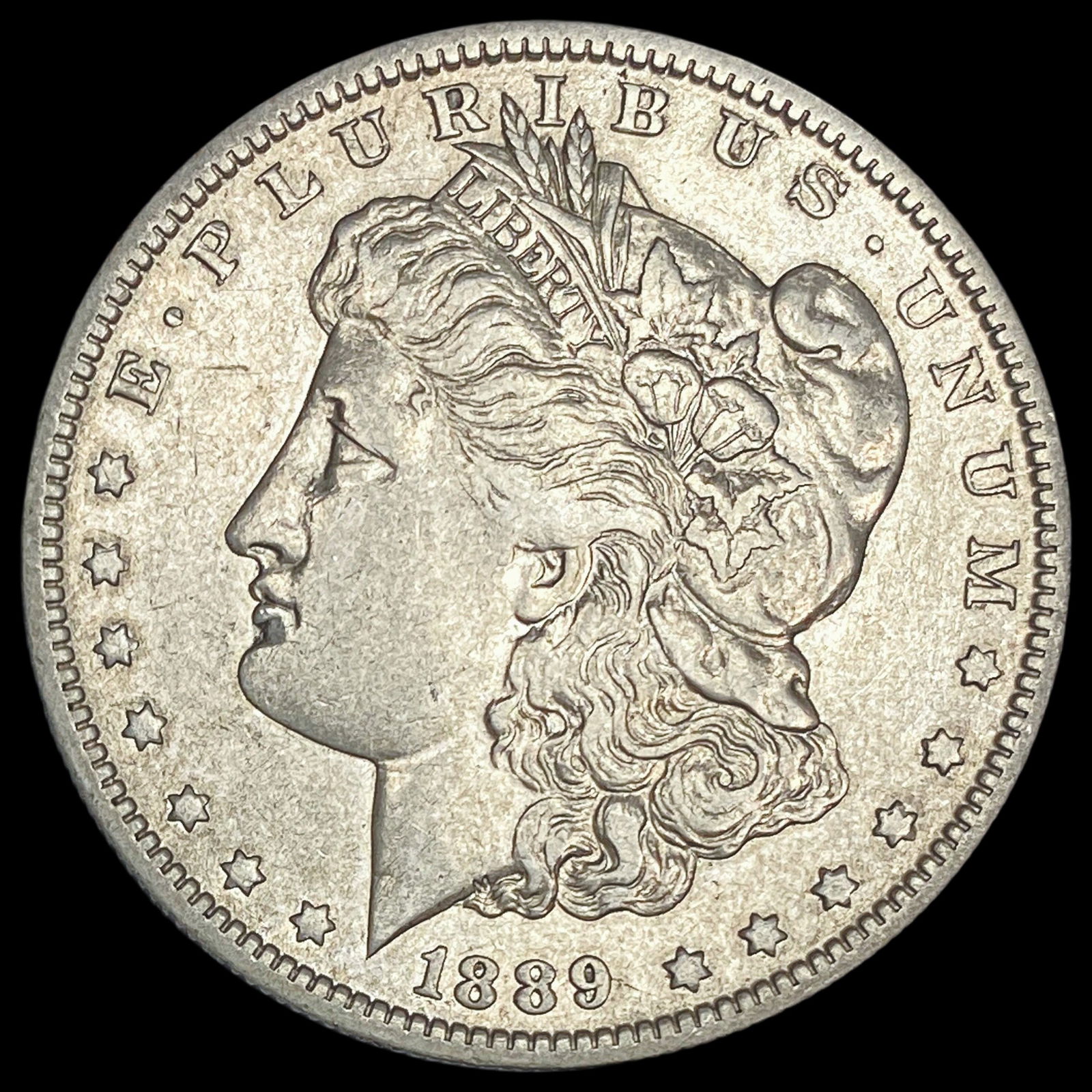 1889-O Silver Morgan Dollar NEARLY UNCIRCULATED (1 of 2)