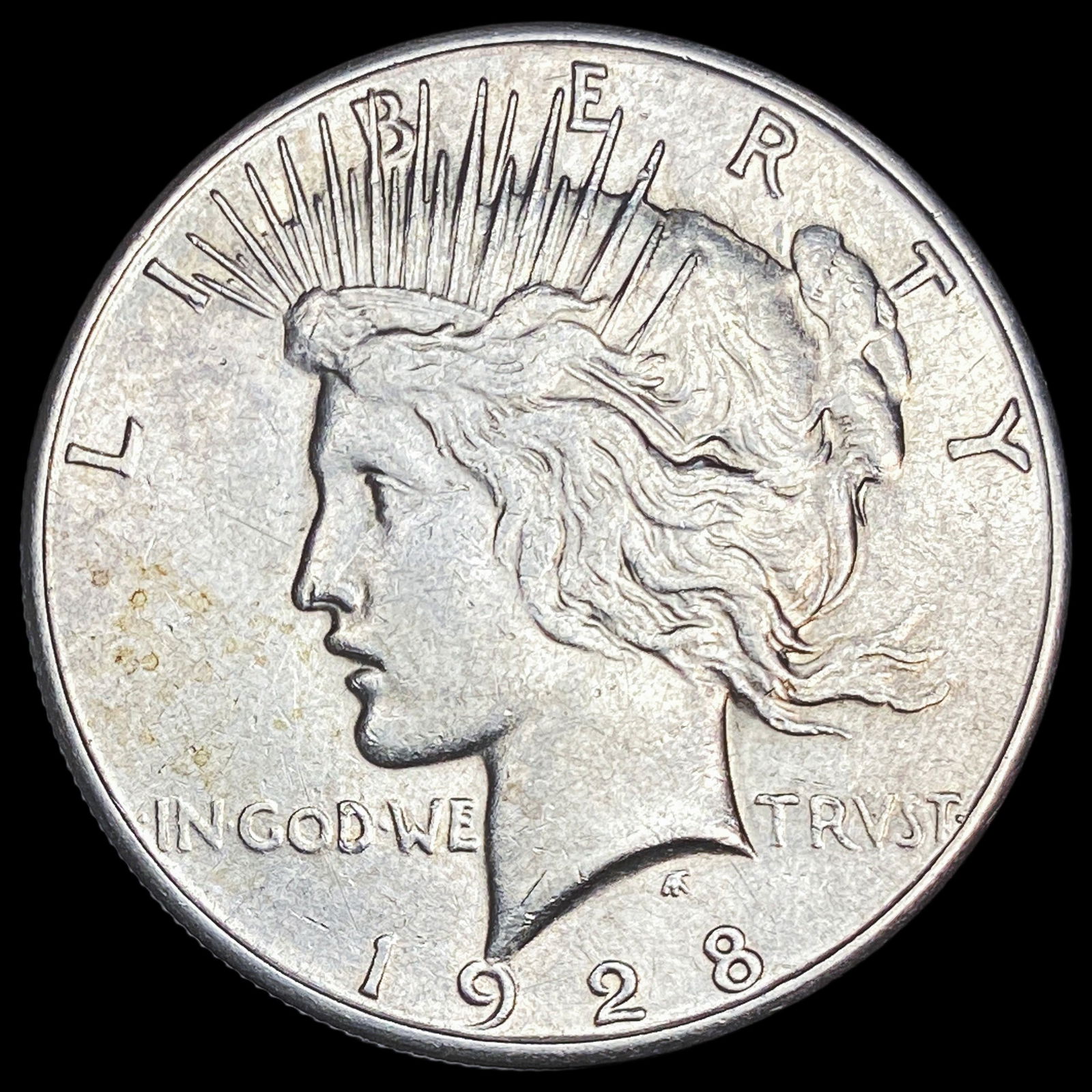 1928 Silver Peace Dollar CLOSELY UNCIRCULATED (1 of 2)