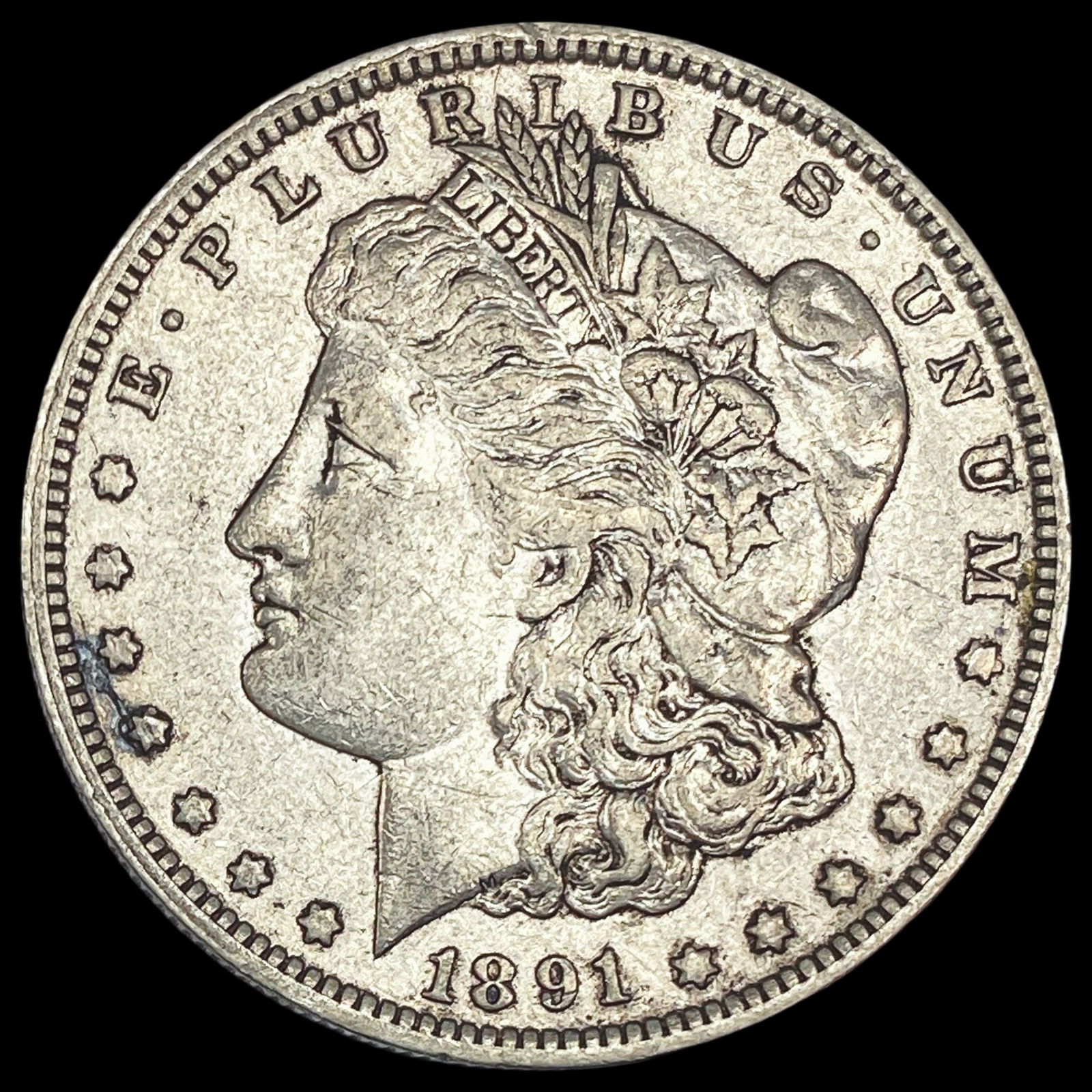 1891-O Silver Morgan Dollar NEARLY UNCIRCULATED (1 of 2)