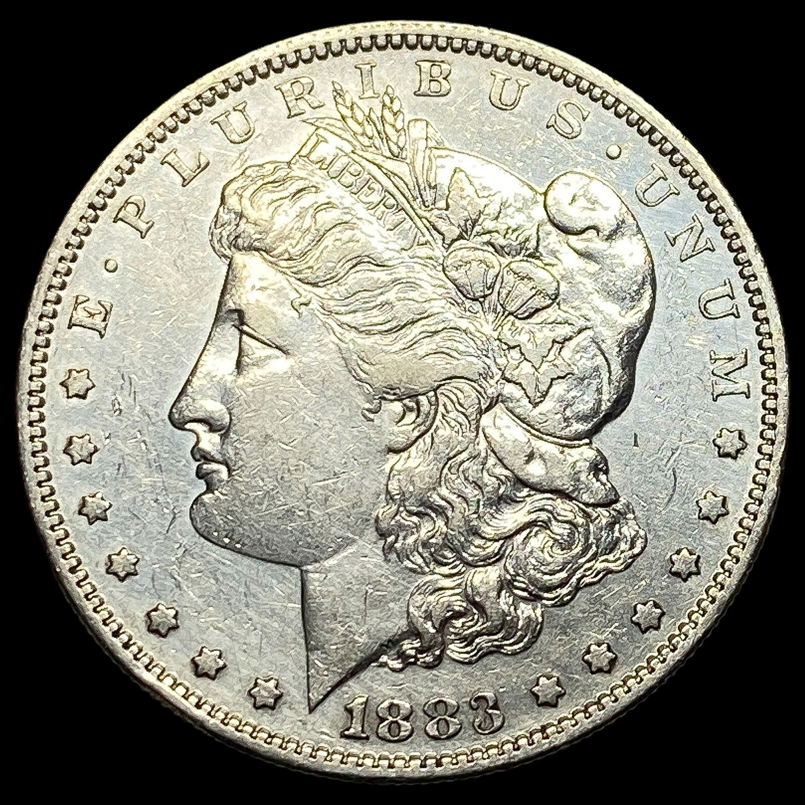 1883-S Silver Morgan Dollar CLOSELY UNCIRCULATED (1 of 2)
