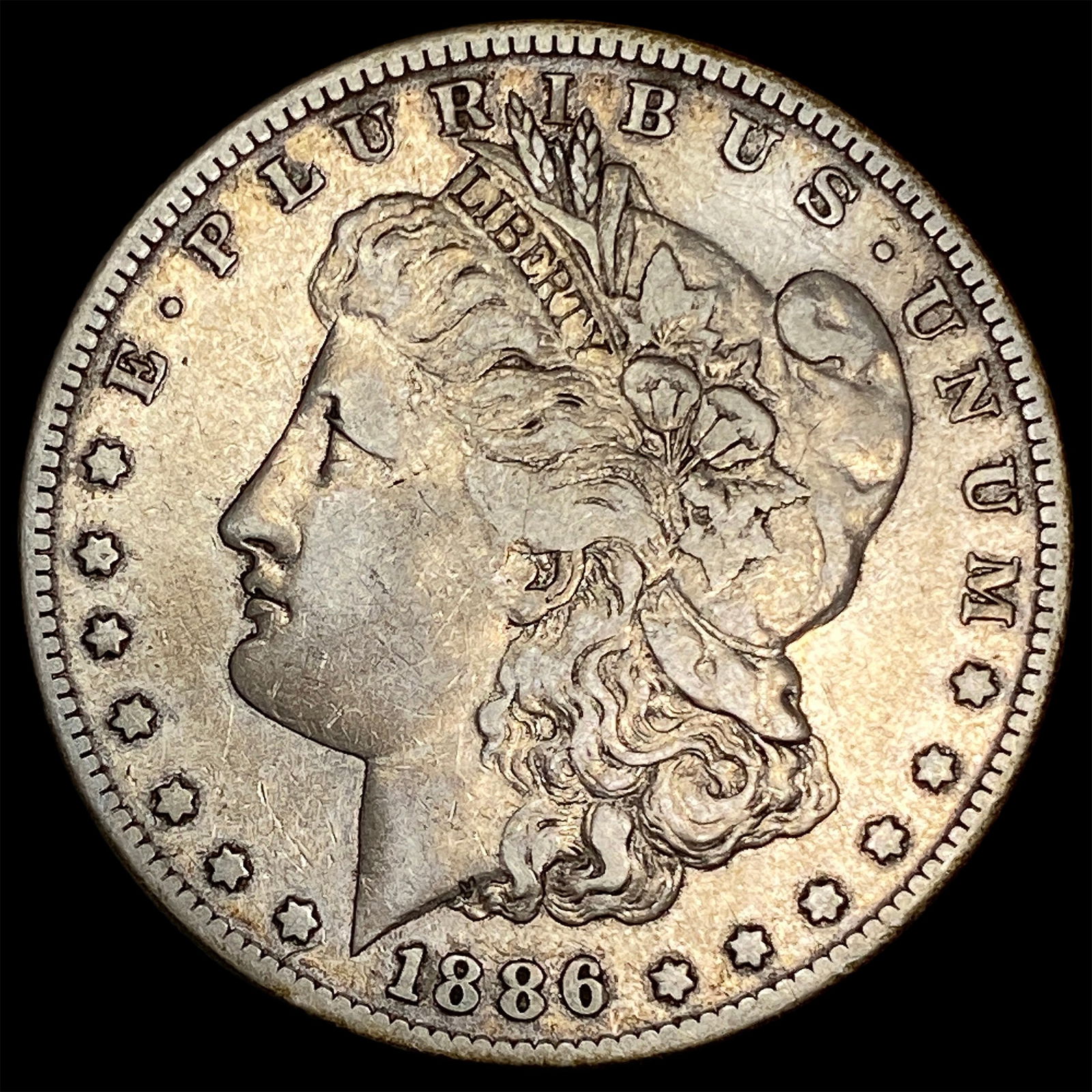 1886-S Silver Morgan Dollar ABOUT UNCIRCULATED (1 of 2)