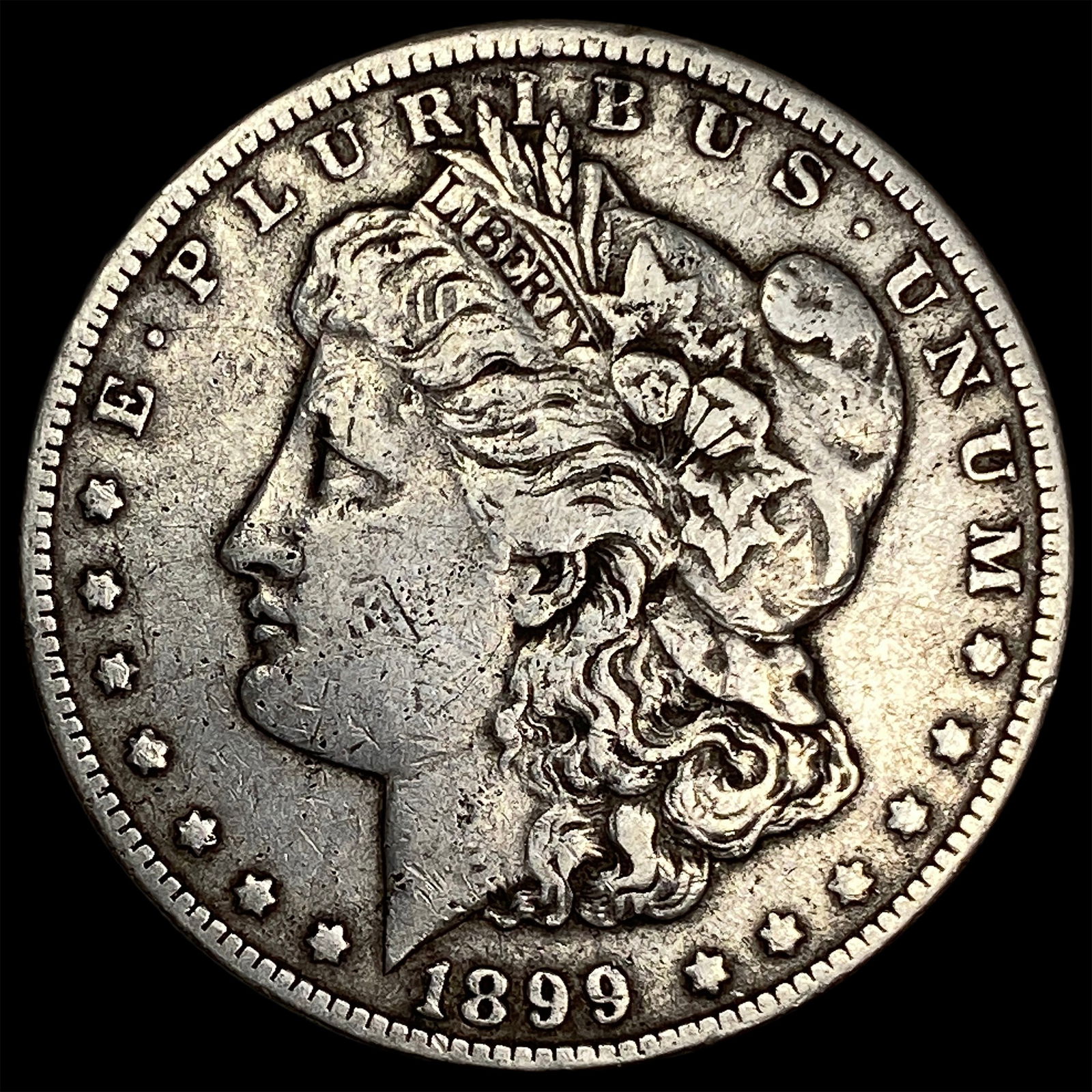 1899-O Silver Morgan Dollar ABOUT UNCIRCULATED (1 of 2)