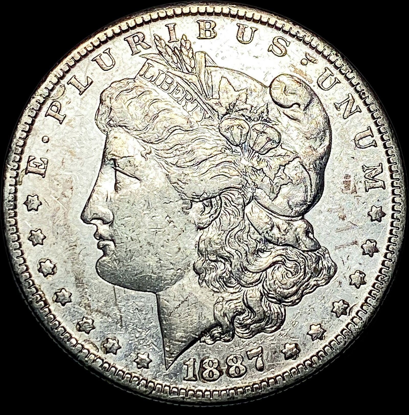 1887-S Silver Morgan Dollar CLOSELY UNCIRCULATED (1 of 2)