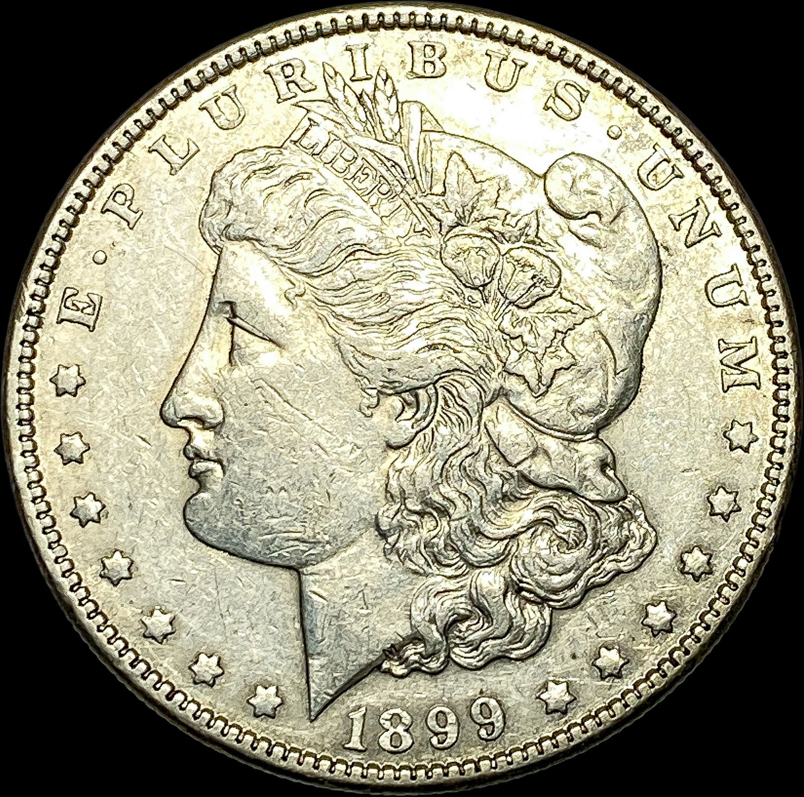 1899 Silver Morgan Dollar CLOSELY UNCIRCULATED (1 of 2)