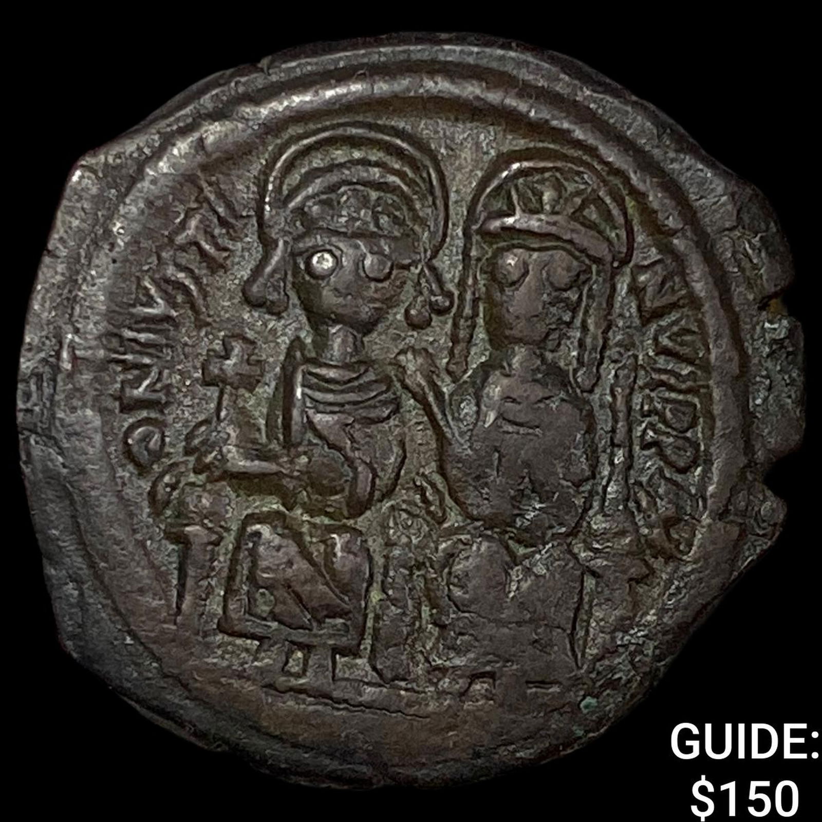 Byzantine Empire Justin II 565-578 Bronze Follis NEARLY UNCIRCULATED (1 of 2)