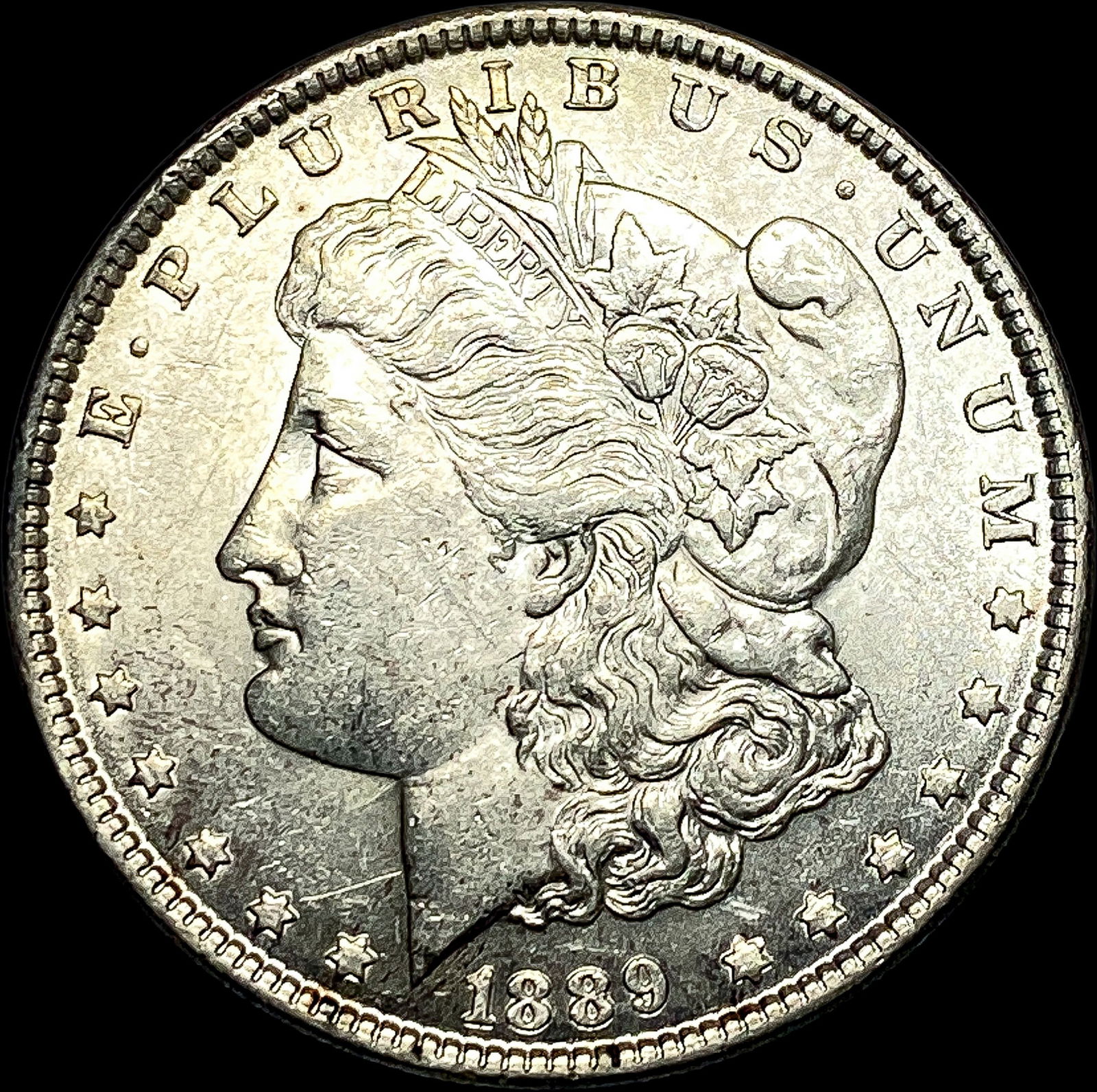 1889 Morgan Silver Dollar CLOSELY UNCIRCULATED (1 of 2)