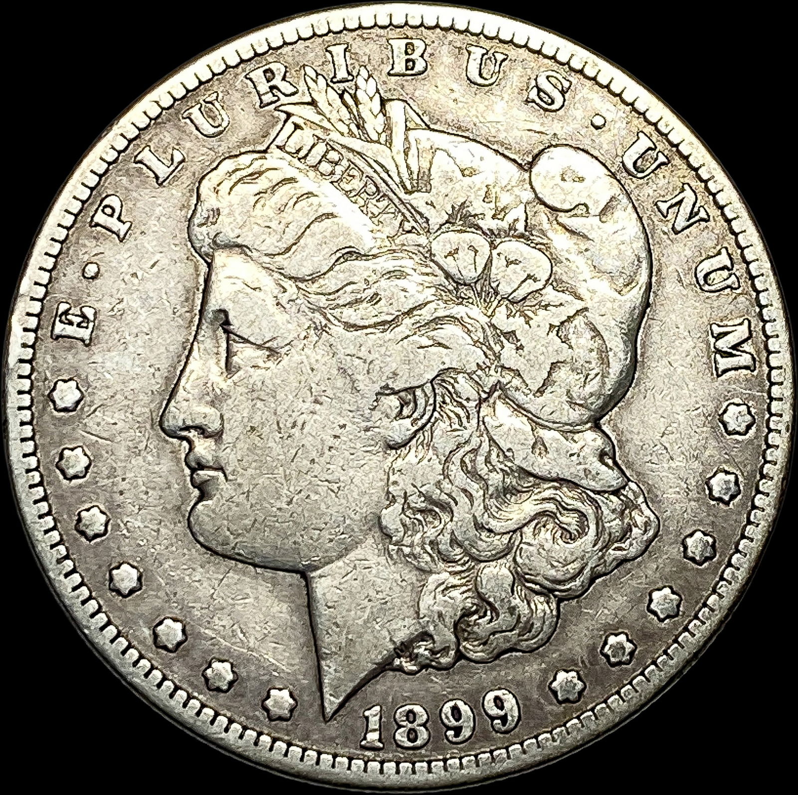 1899-S Silver Morgan Dollar ABOUT UNCIRCULATED (1 of 2)