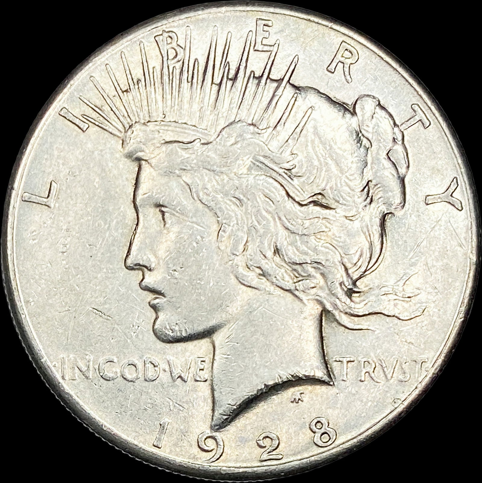 1928 Silver Peace Dollar CLOSELY UNCIRCULATED (1 of 2)