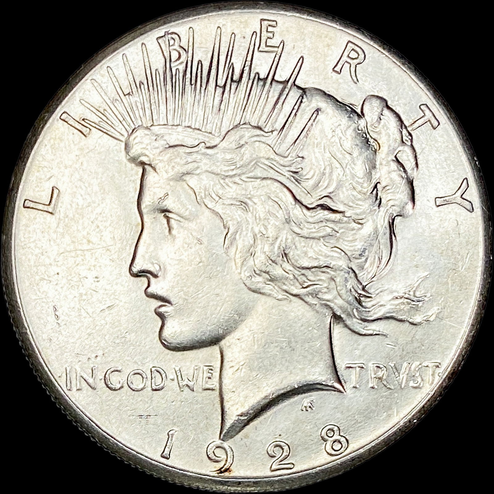 1928 Silver Peace Dollar CLOSELY UNCIRCULATED (1 of 2)