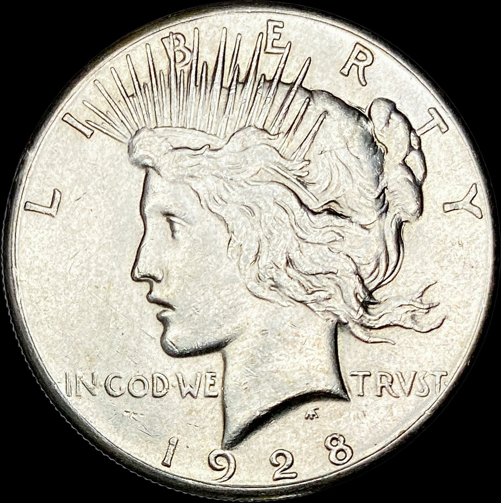 1928 Silver Peace Dollar CLOSELY UNCIRCULATED (1 of 2)