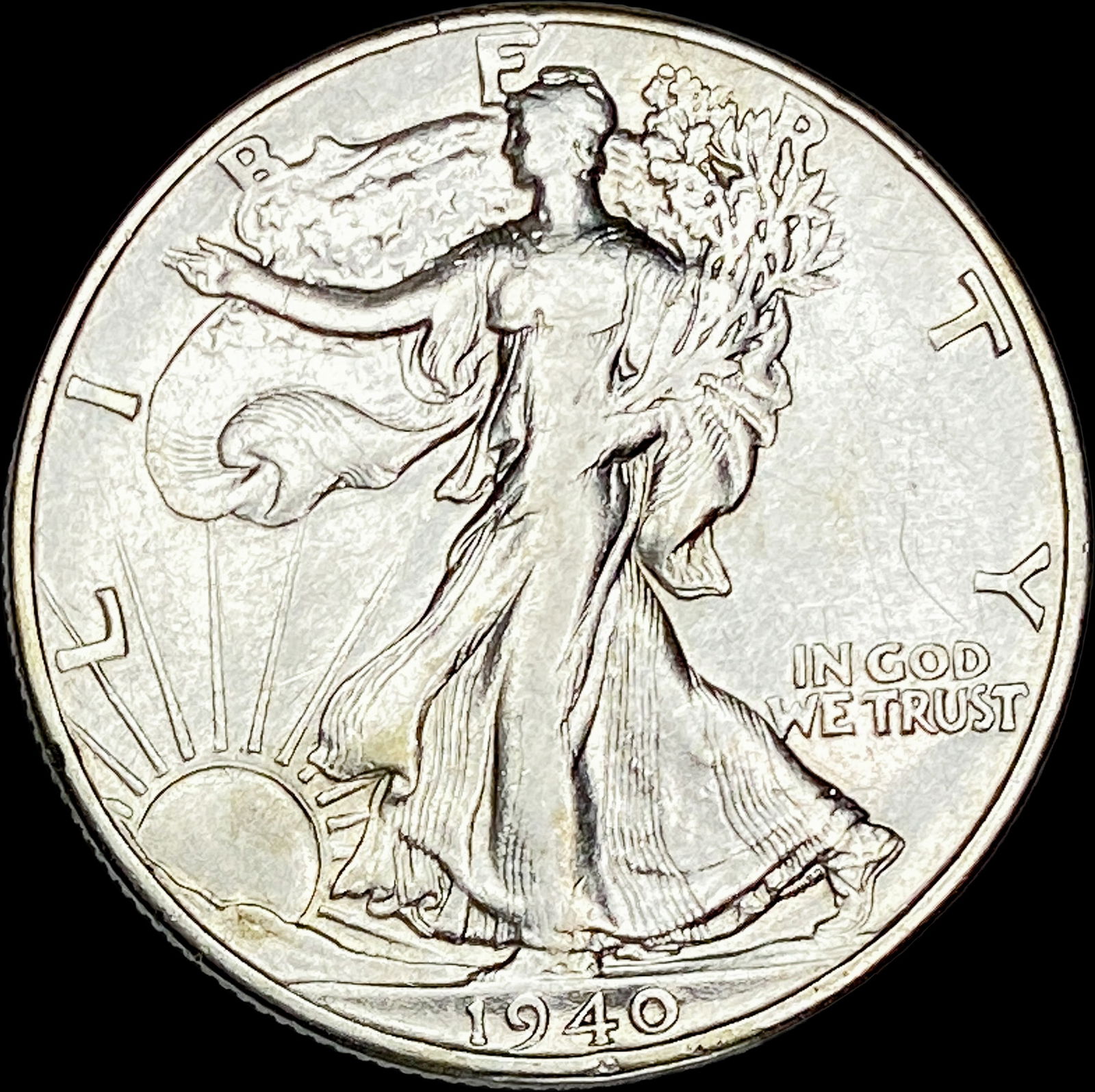 1940 Silver Half Dollar CLOSELY UNCIRCULATED (1 of 2)