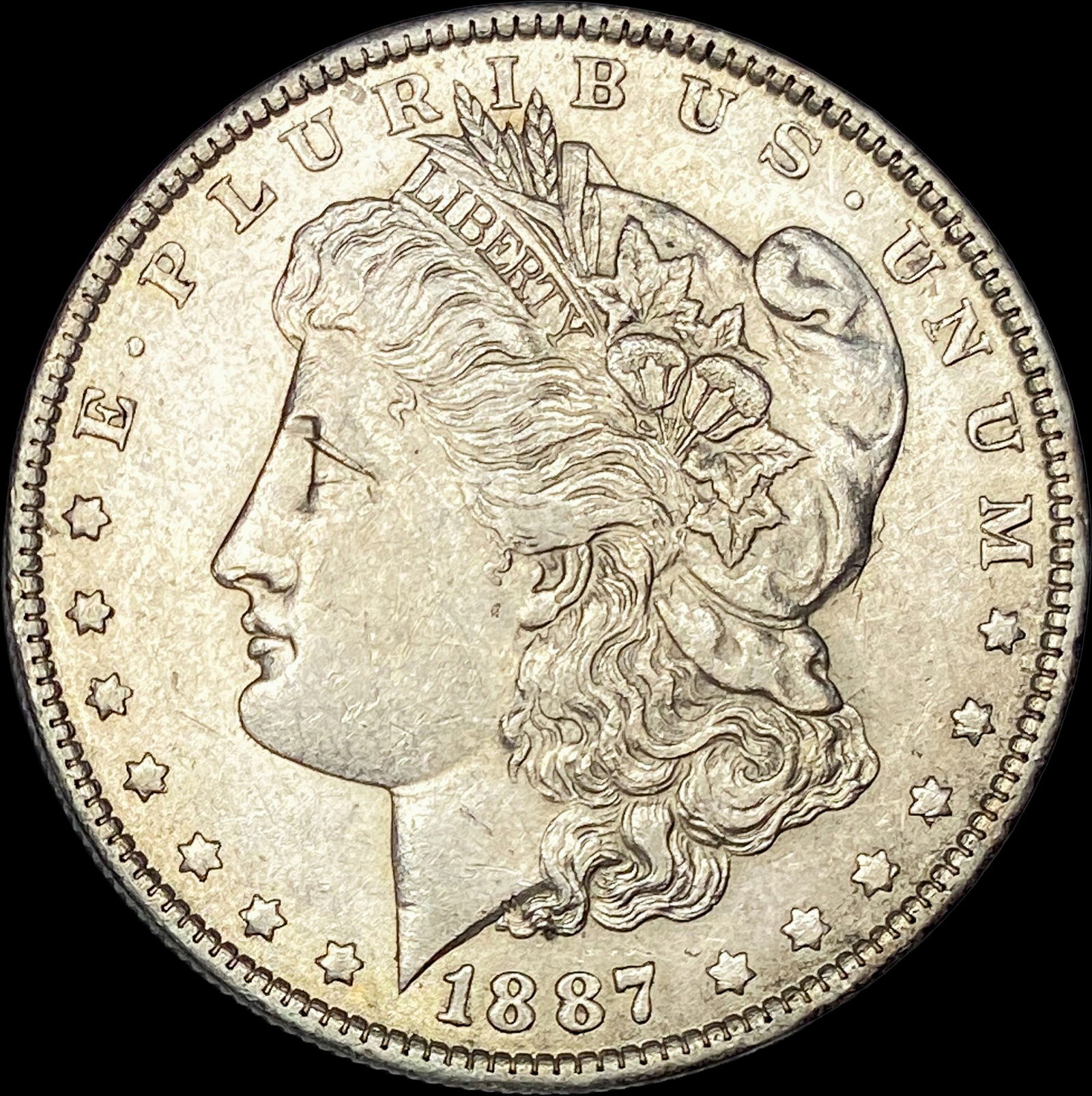 1887-O Silver Morgan Dollar CLOSELY UNCIRCULATED (1 of 2)