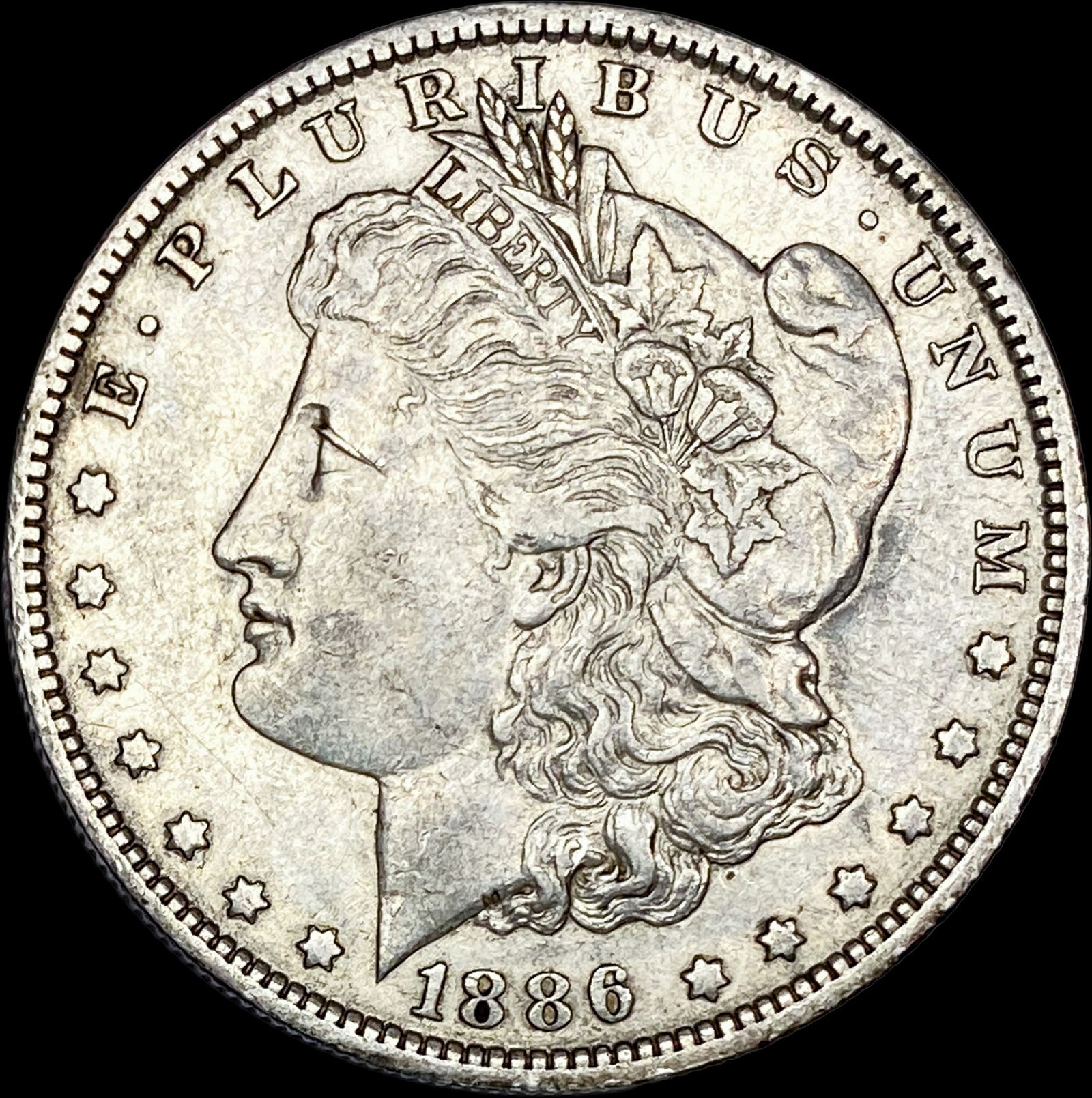 1886-O Silver Morgan Dollar NEARLY UNCIRCULATED (1 of 2)