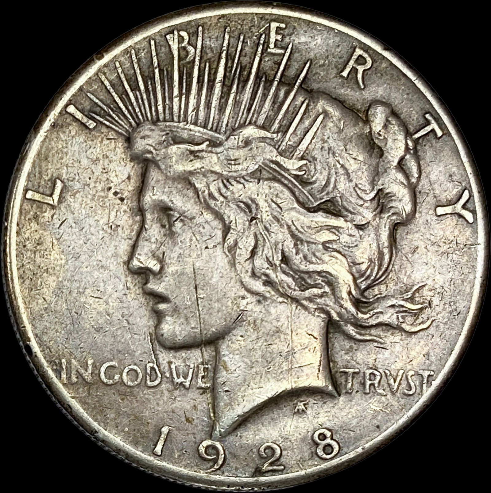 1928 Silver Peace Dollar NICELY CIRCULATED (1 of 2)