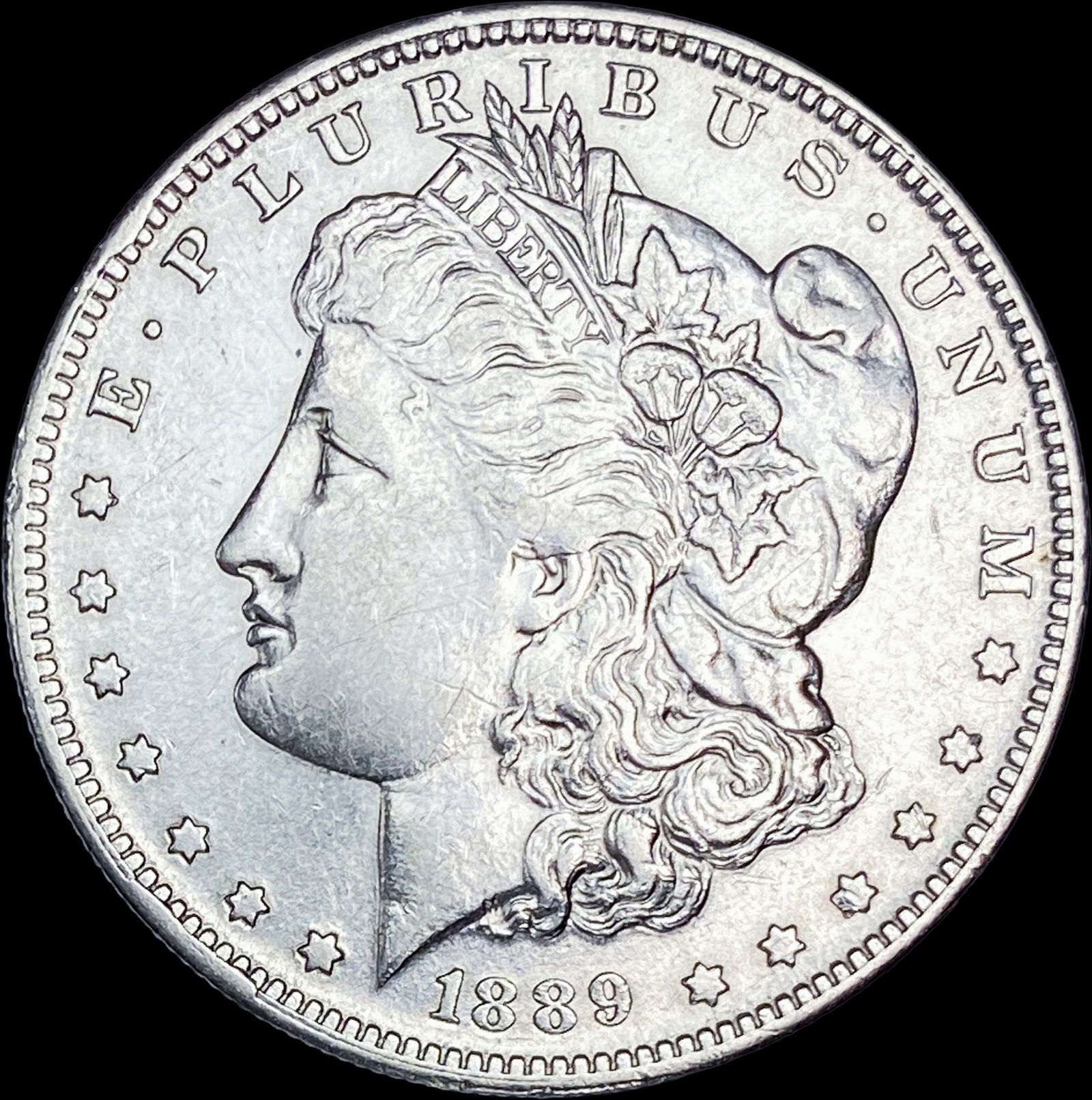 1889 Silver Morgan Dollar CLOSELY UNCIRCULATED (1 of 2)