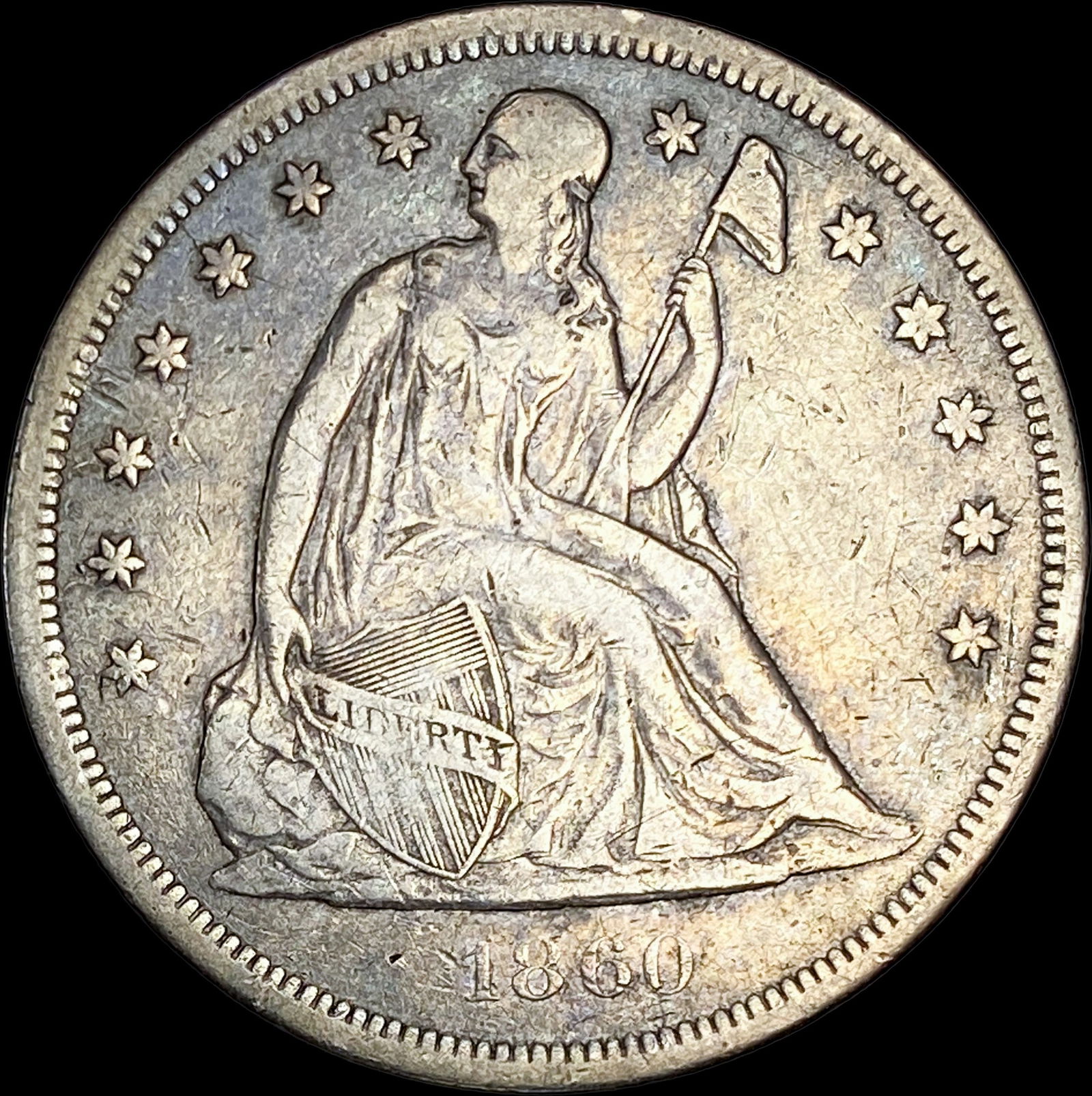 1860-O Silver Seated Liberty Dollar ABOUT UNCIRCULATED (1 of 2)