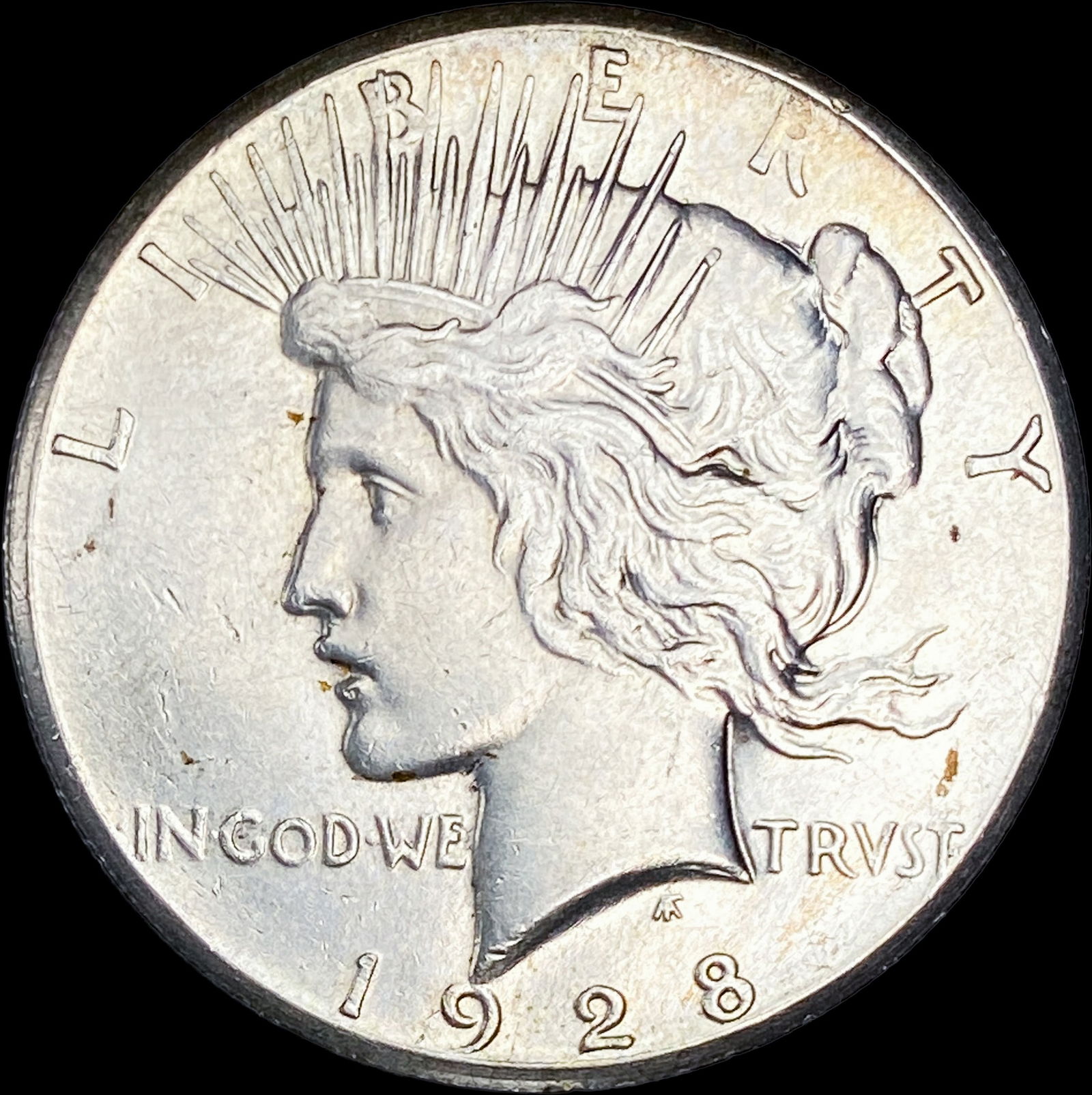 1928 Silver Peace Dollar CLOSELY UNCIRCULATED (1 of 2)