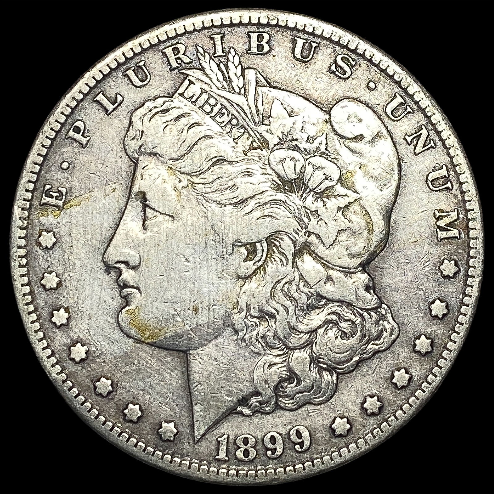 1899-S Silver Morgan Dollar ABOUT UNCIRCULATED: 1899-S Silver Morgan Dollar ABOUT UNCIRCULATED