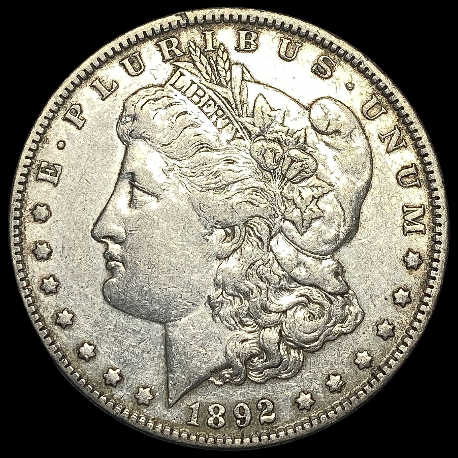 1892-S Silver Morgan Dollar NEARLY UNCIRCULATED (1 of 2)
