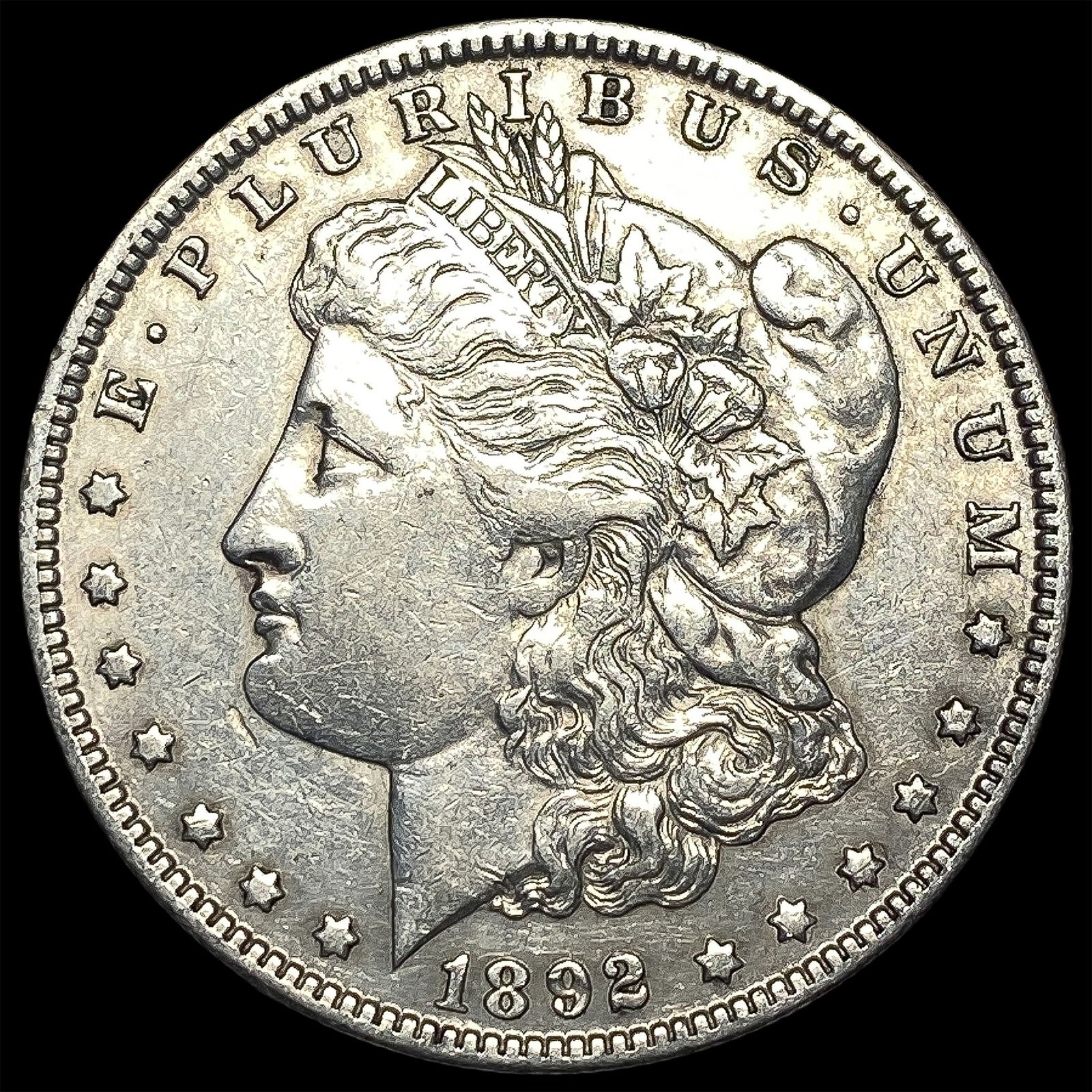 1892-O Silver Morgan Dollar NEARLY UNCIRCULATED (1 of 2)