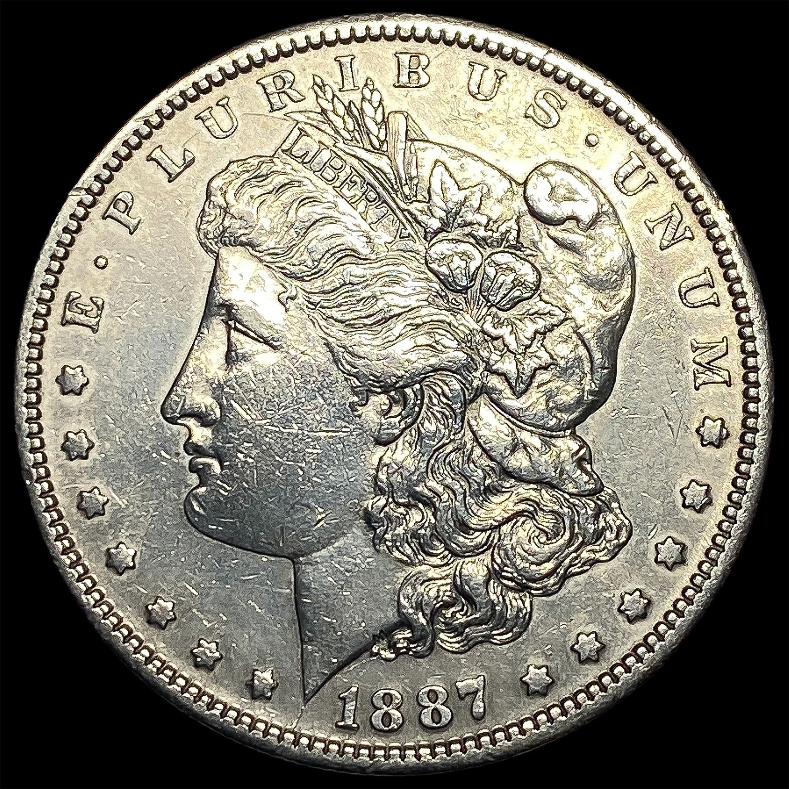1887-S Silver Morgan Dollar CLOSELY UNCIRCULATED (1 of 2)