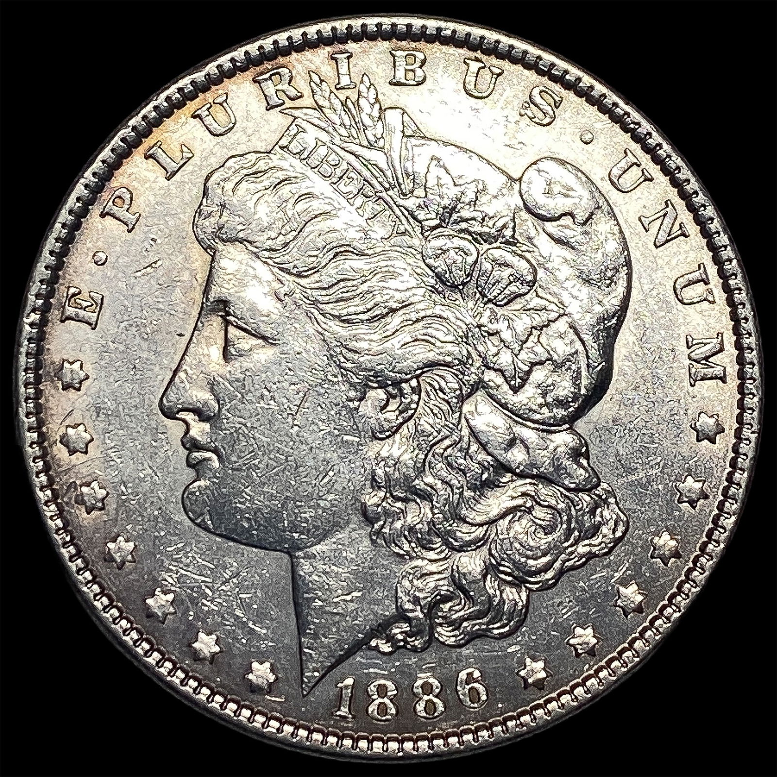 1886 Silver Morgan Dollar CLOSELY UNCIRCULATED (1 of 2)