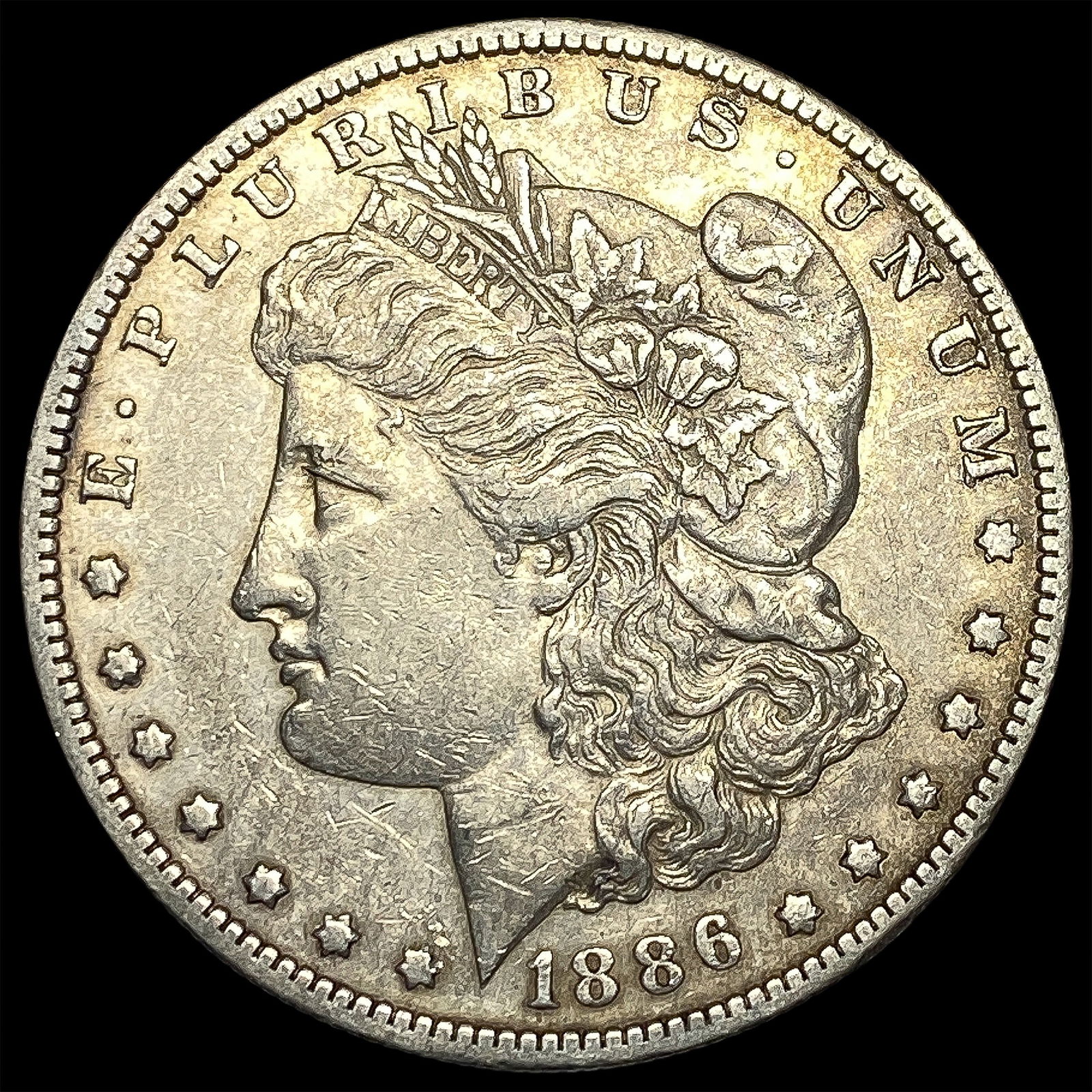 1886-O Silver Morgan Dollar CLOSELY UNCIRCULATED (1 of 2)