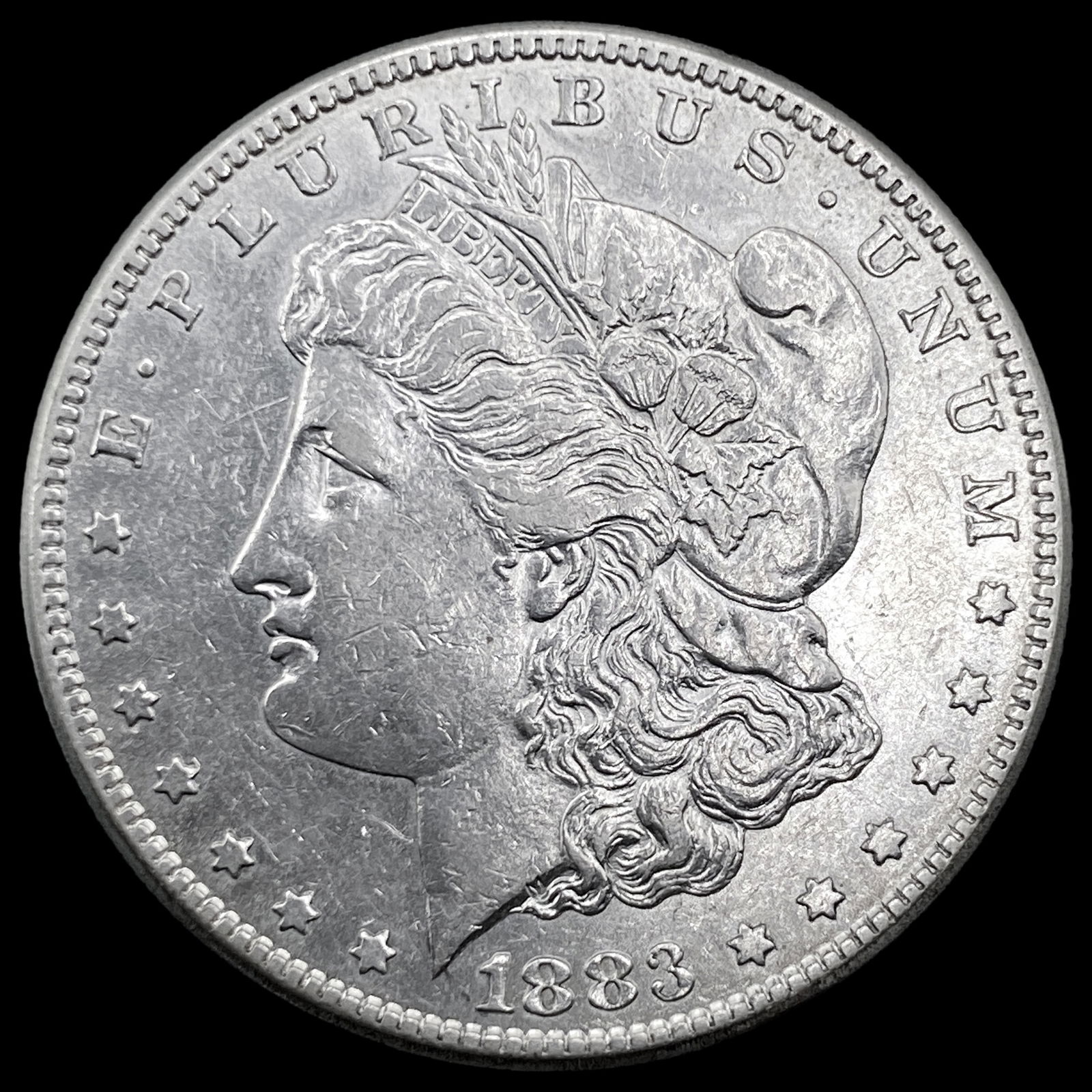 1883-S Silver Morgan Dollar CLOSELY UNCIRCULATED (1 of 2)