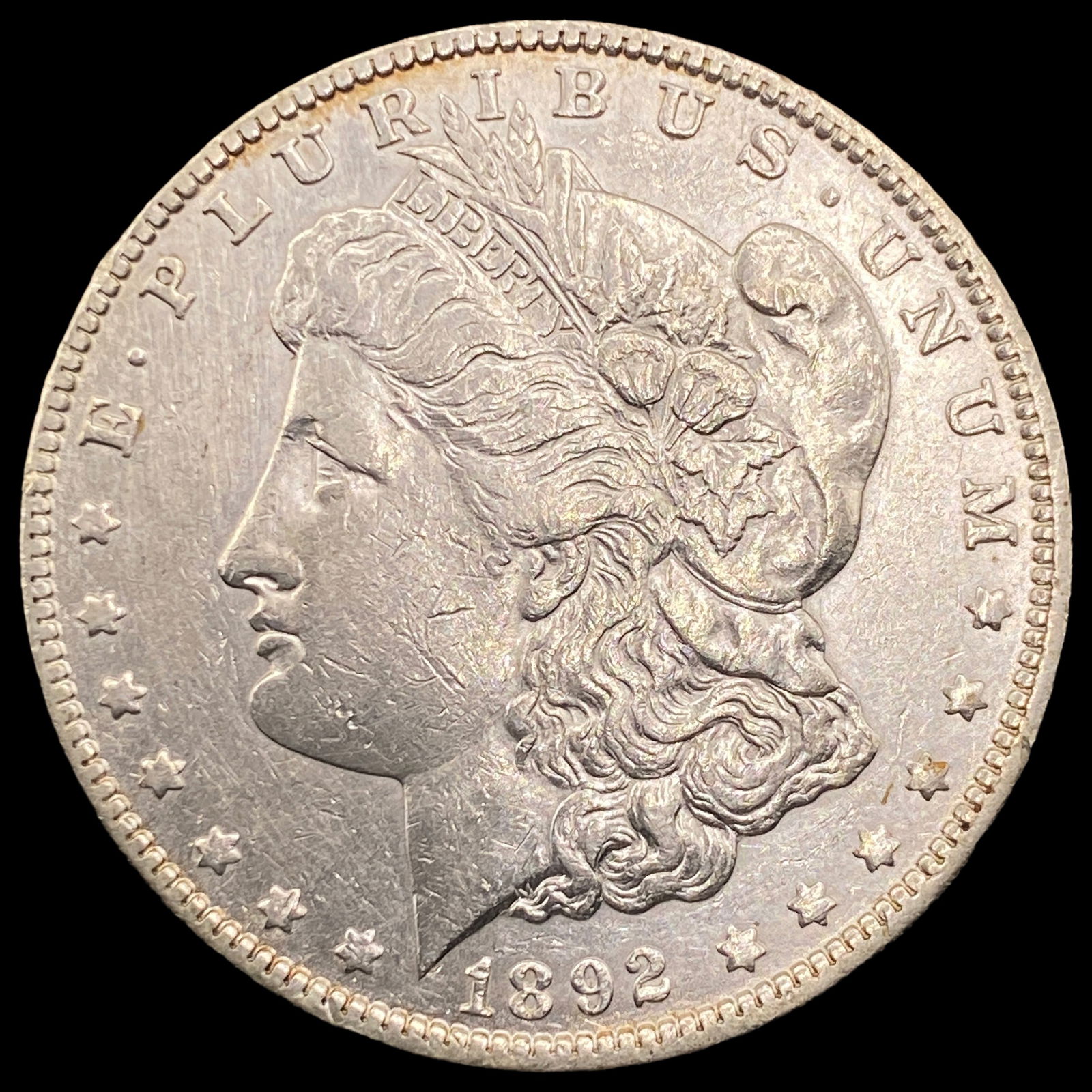 1892-O Morgan Silver Dollar CLOSELY UNCIRCULATED (1 of 2)