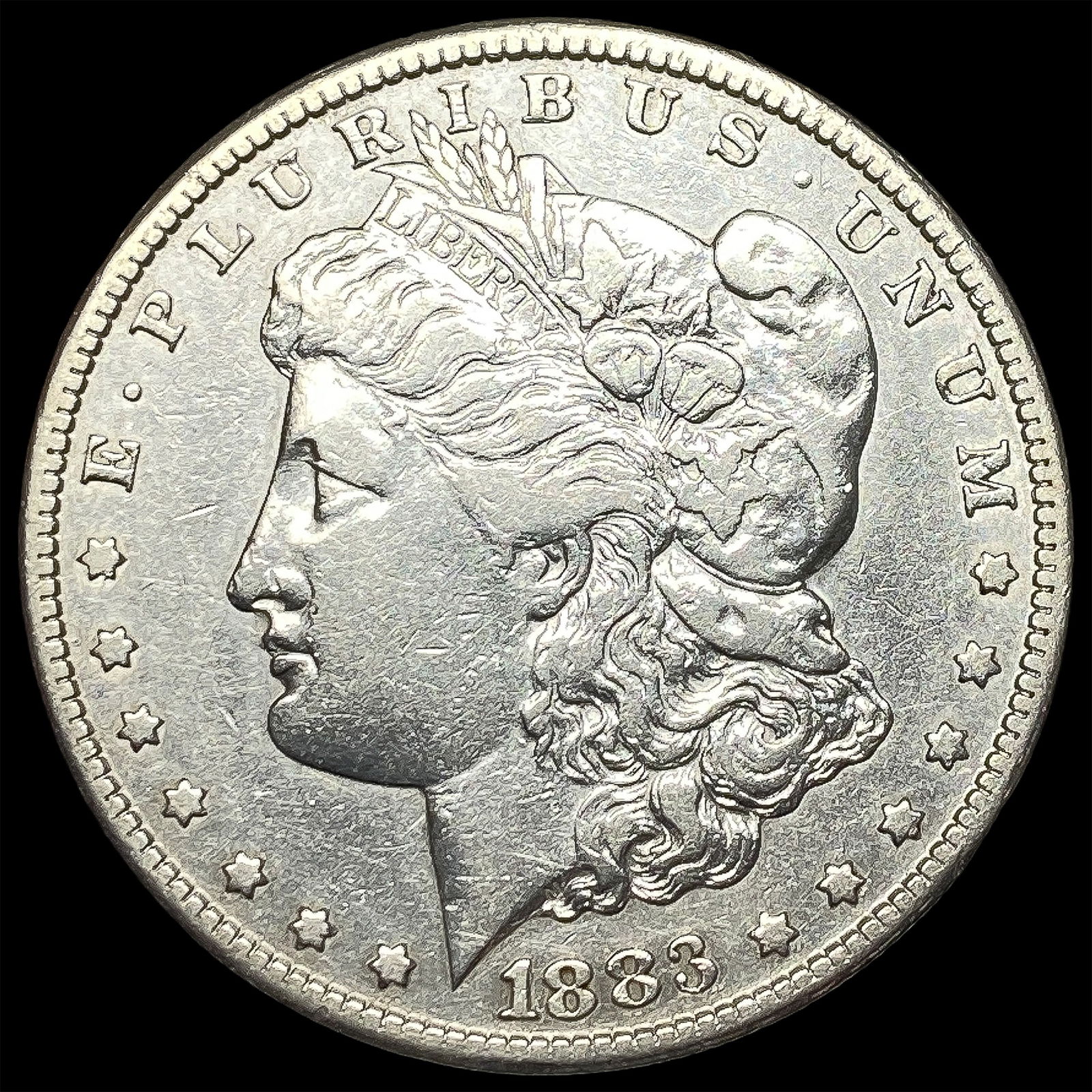 1883-CC Silver Morgan Dollar NEARLY UNCIRCULATED (1 of 2)