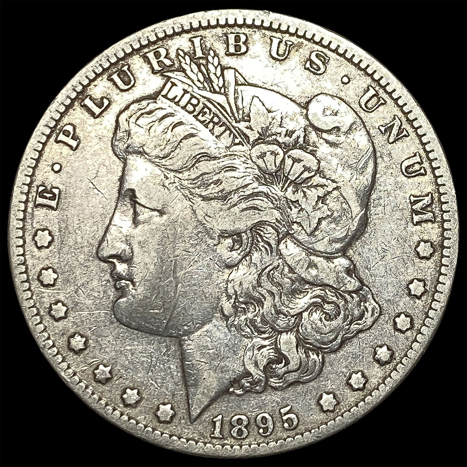 1895-O Silver Morgan Dollar NEARLY UNCIRCULATED (1 of 2)