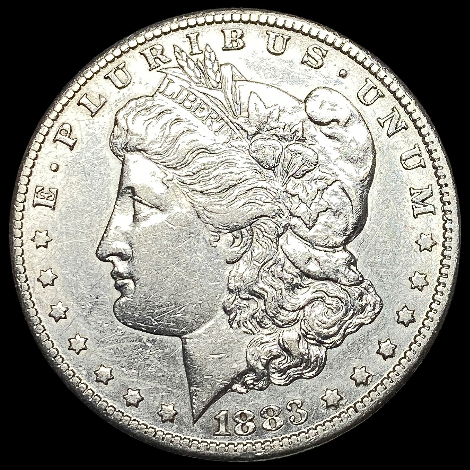 1883-CC Silver Morgan Dollar CLOSELY UNCIRCULATED (1 of 2)